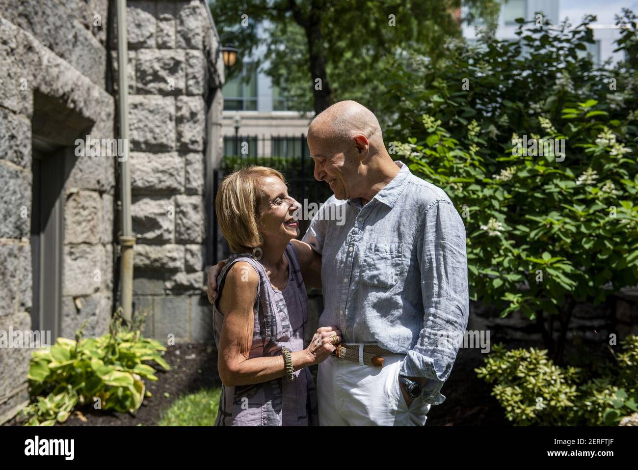 Melinda Watman, left, and husband Kenneth Watman enjoy each others company outside of their home on Saturday, July 28, 2018, in Boston, Mass image