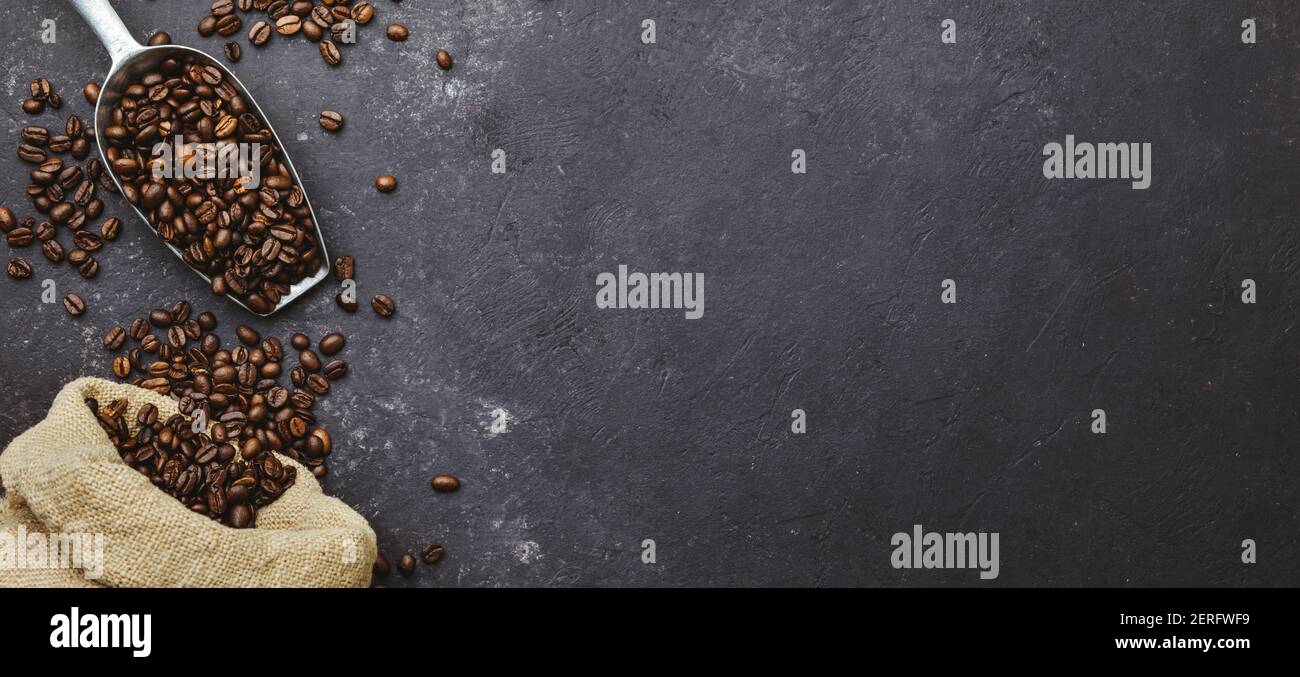 coffee beans in a sack on dark background, top view Stock Photo - Alamy