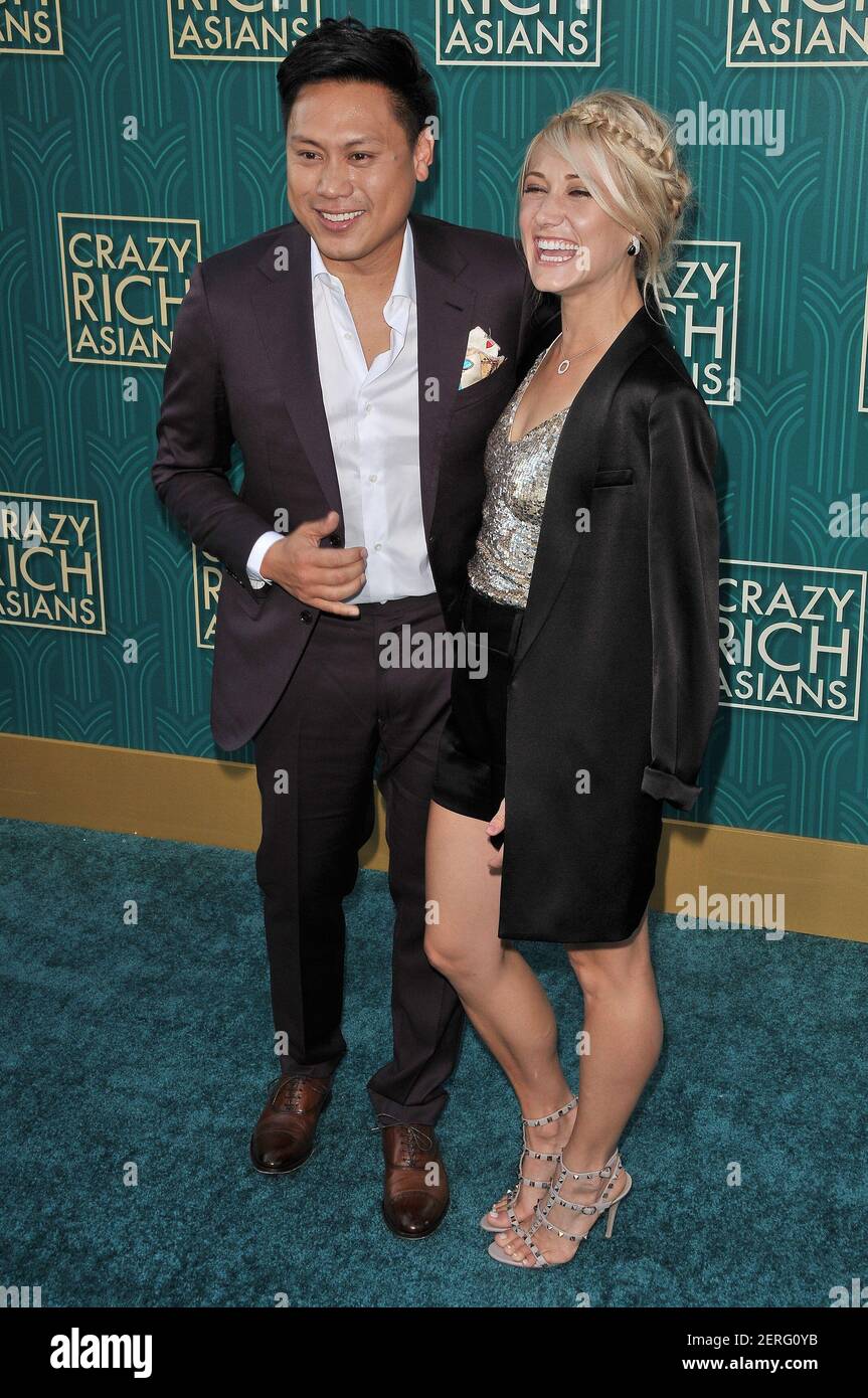 L-R) Jon M. Chu and Wife Kristin Hodge arrives at the “Crazy Rich Asians”  Los Angeles Premiere held at the TCL Chinese Theater in Hollywood, CA on  Tuesday, August 7, 2018. (Photo