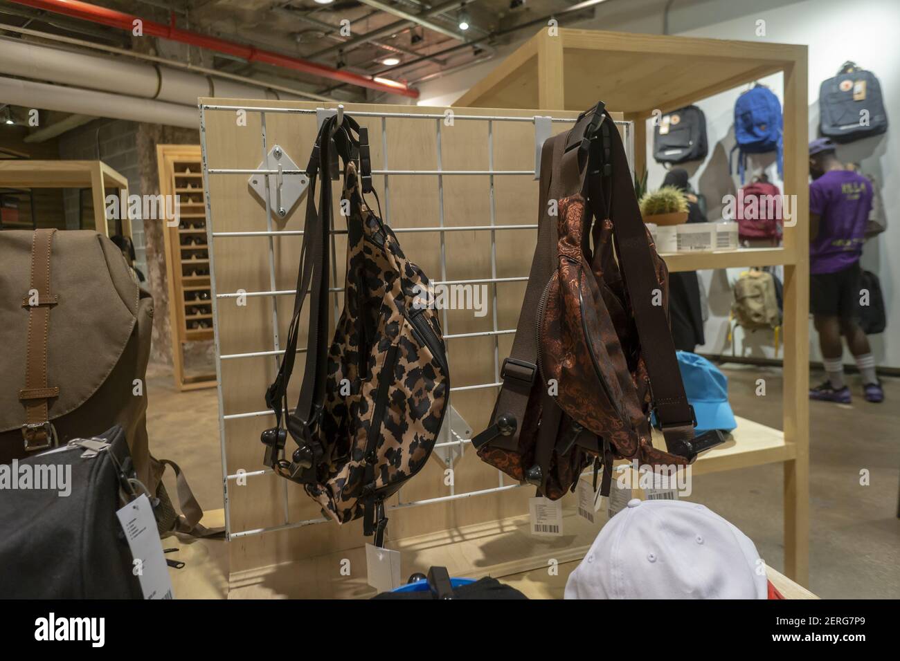 A selection of fanny packs in an Urban Outfitters retail store in Herald  Square in New York on Thursday, August 9, 2018. Retailers are hoping that a  revival of 90's fashions such