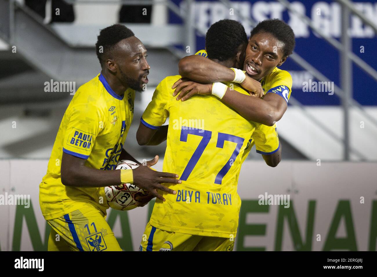 SINT-TRUIDEN, BELGIUM - AUGUST Mohamed Buva Turay celebrate after scoring a  goal with Jordan Botaka and Yohan Boli during the Jupiler Pro League  matchday 3 between STVV and Sporting Lokeren on August
