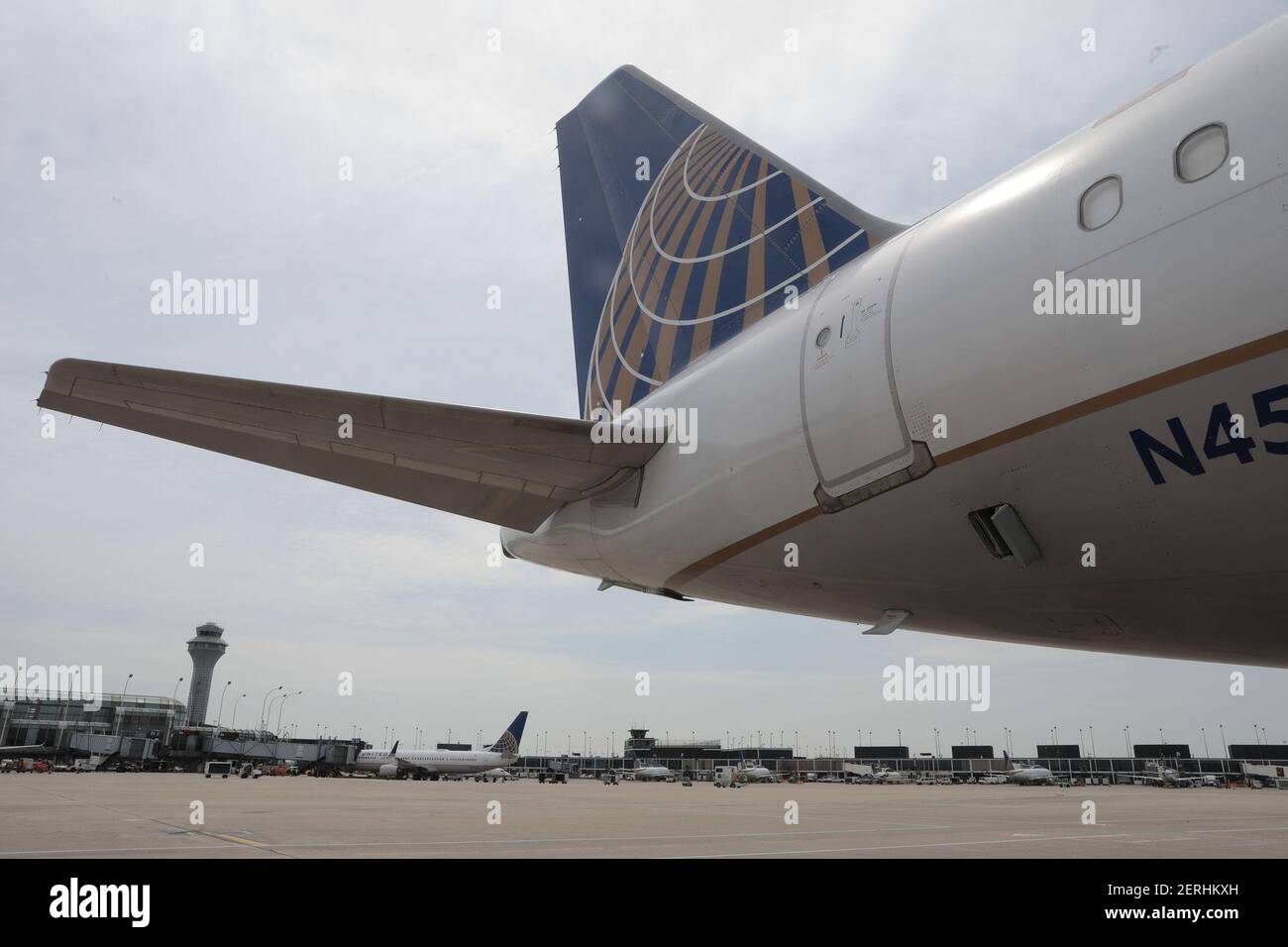 United Airlines jets sit at gates at Chicago O'Hare International Airport in July 2018. United President Scott Kirby said the carrier will charge an extra fee for economy seats near the front of the plane, behind the 'Economy Plus' seats. (Antonio Perez/ Chicago Tribune/TNS/Sipa USA) Stock Photo