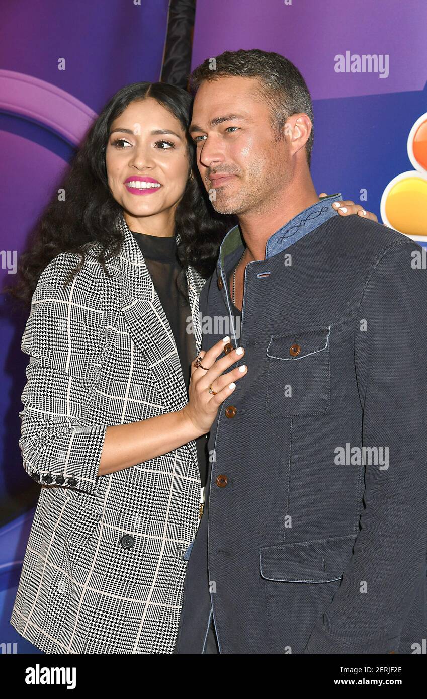 Miranda Rae Mayo and Taylor Kinney of " Chicago Fire" attend the NBC