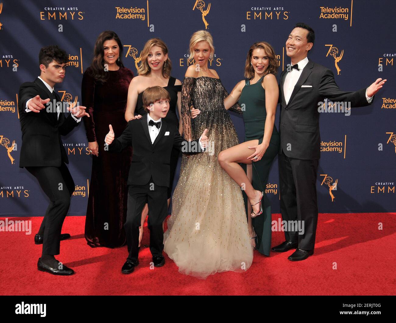 L-R) "Alexa & Katie" Cast - Emery Kelly, Tiffani Thiessen, Finn Carr, Jolie  Jenkins, Isabel May, Paris Berelc and Eddie Shin arrives at the 2018  Creative Arts Emmy Awards - Day 1