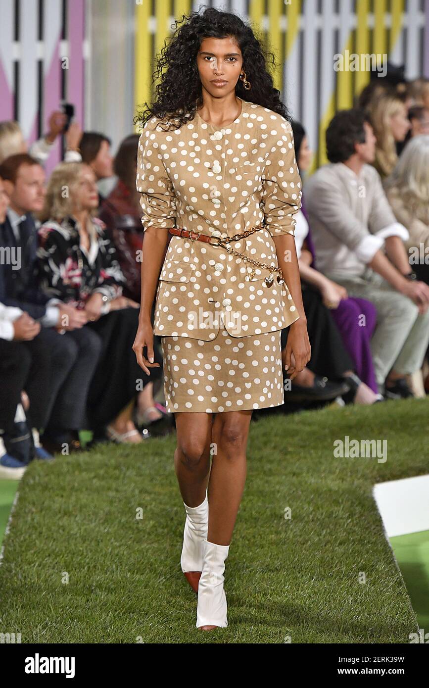 Model Pooja Mor walks on the runway during the Escada Fashion Show ...