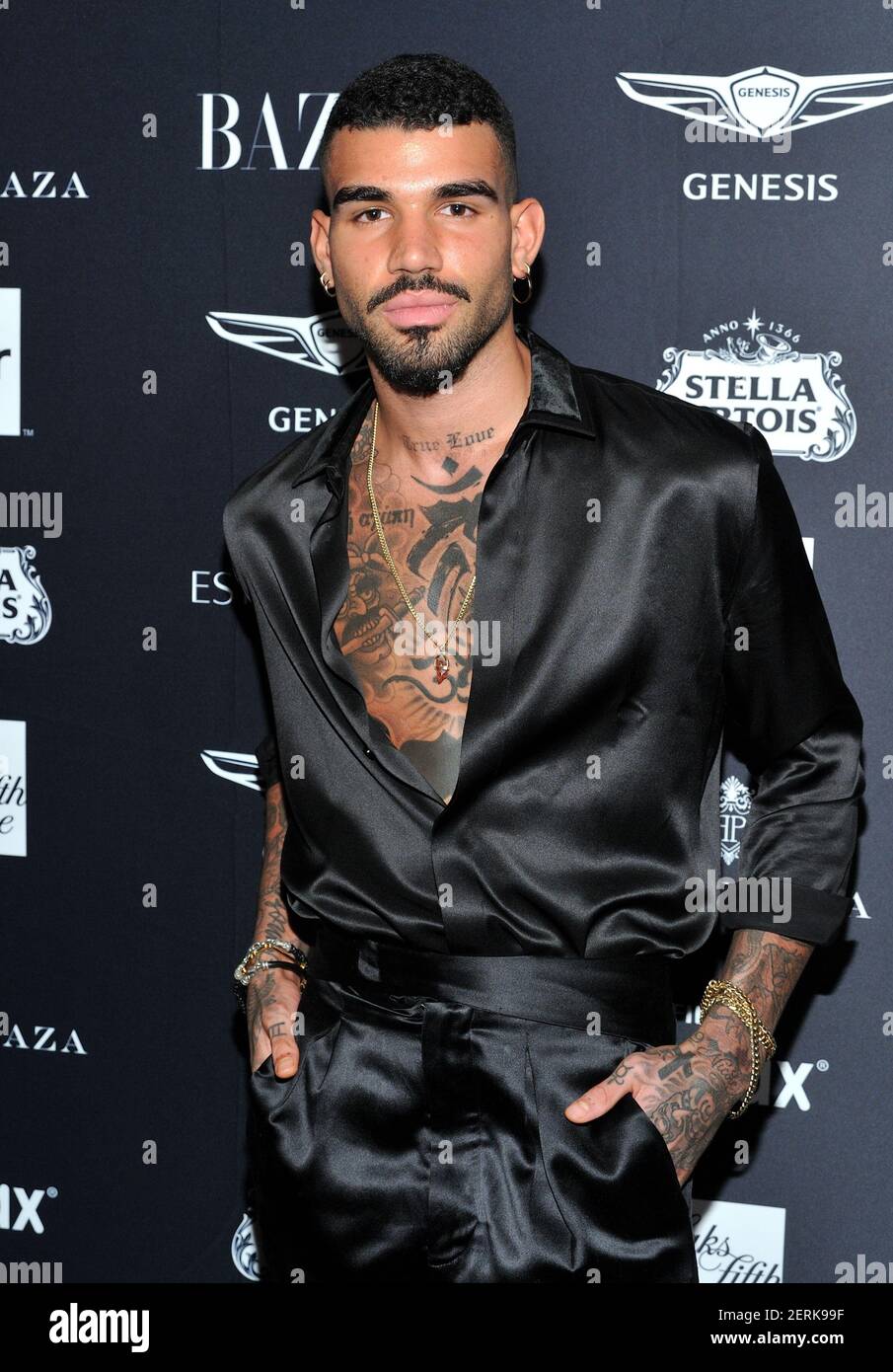 Miles Ritchie attends the Harper's Bazaar Icons by Carine Roitfeld ...