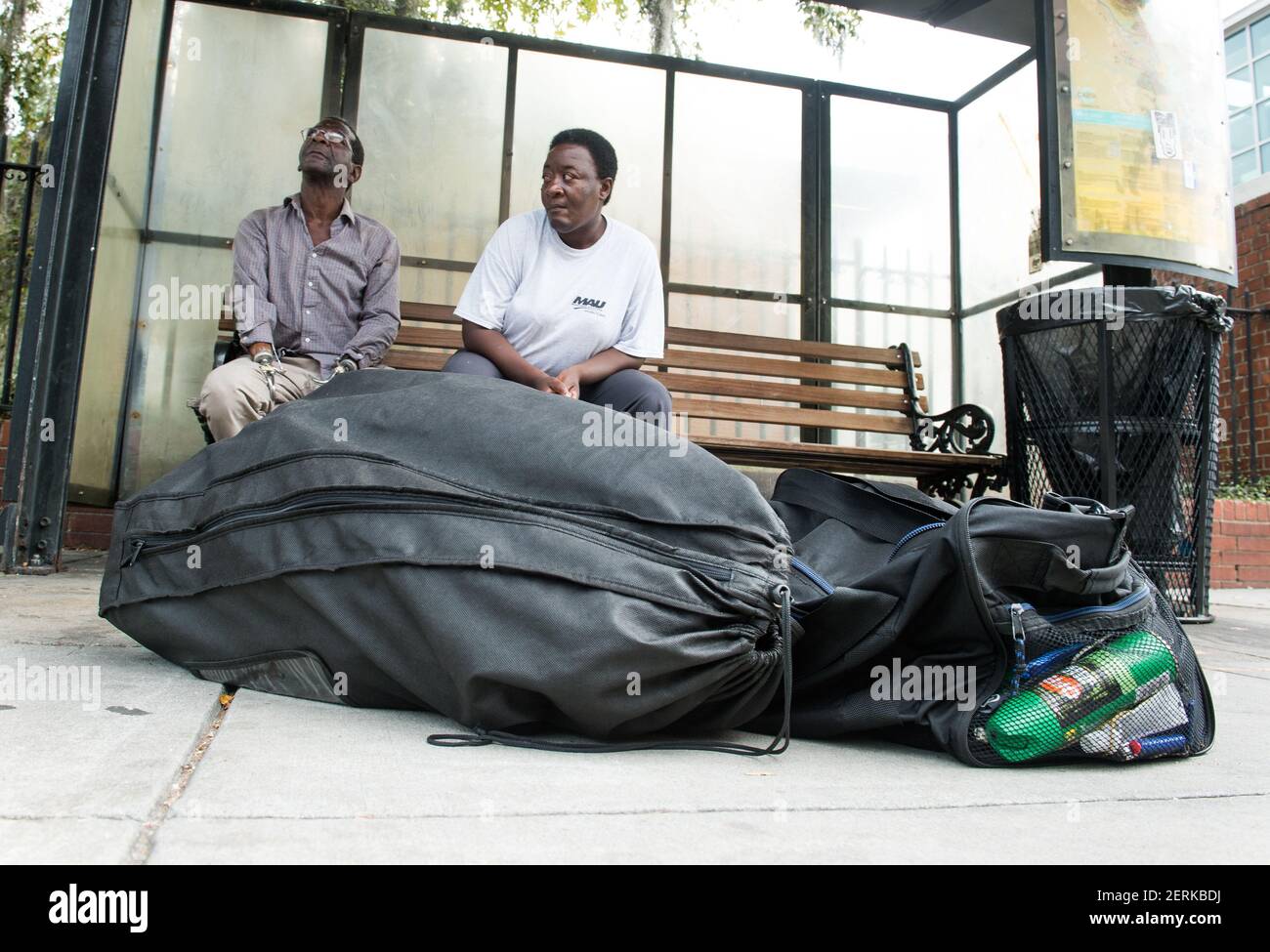 Sep 12, 2018; Charleston, SC; Henry Wright, 60, (left) waits in downtown Charleston at a Charleston Area Regional Transportation Authority (CARTA) bus stop which serves as a Hurricane Evacuation Bus Stop picking up people needing transport to the Charleston County Government Complex to be evacuated on buses to locations further inland such as Columbia, SC prior to Hurricane Florence making landfall along the East Coast. Mandatory Credit: Jack Gruber-USA TODAY/Sipa USA *** NO TABLOIDS *** Stock Photo