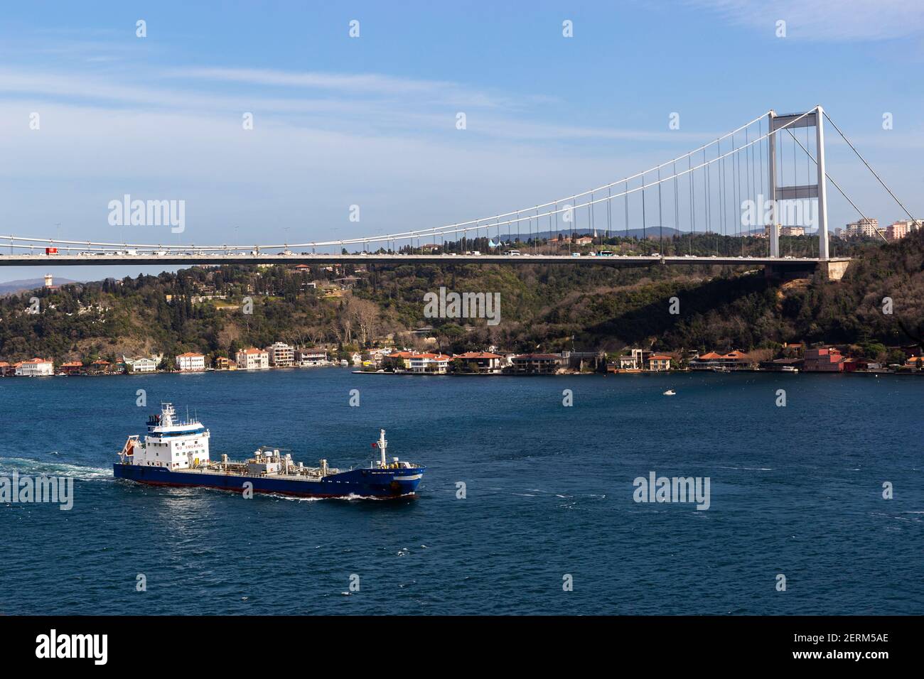 Commercial cargo ship go through the Bosphorus Strait, Istanbul, Turkey. Stock Photo