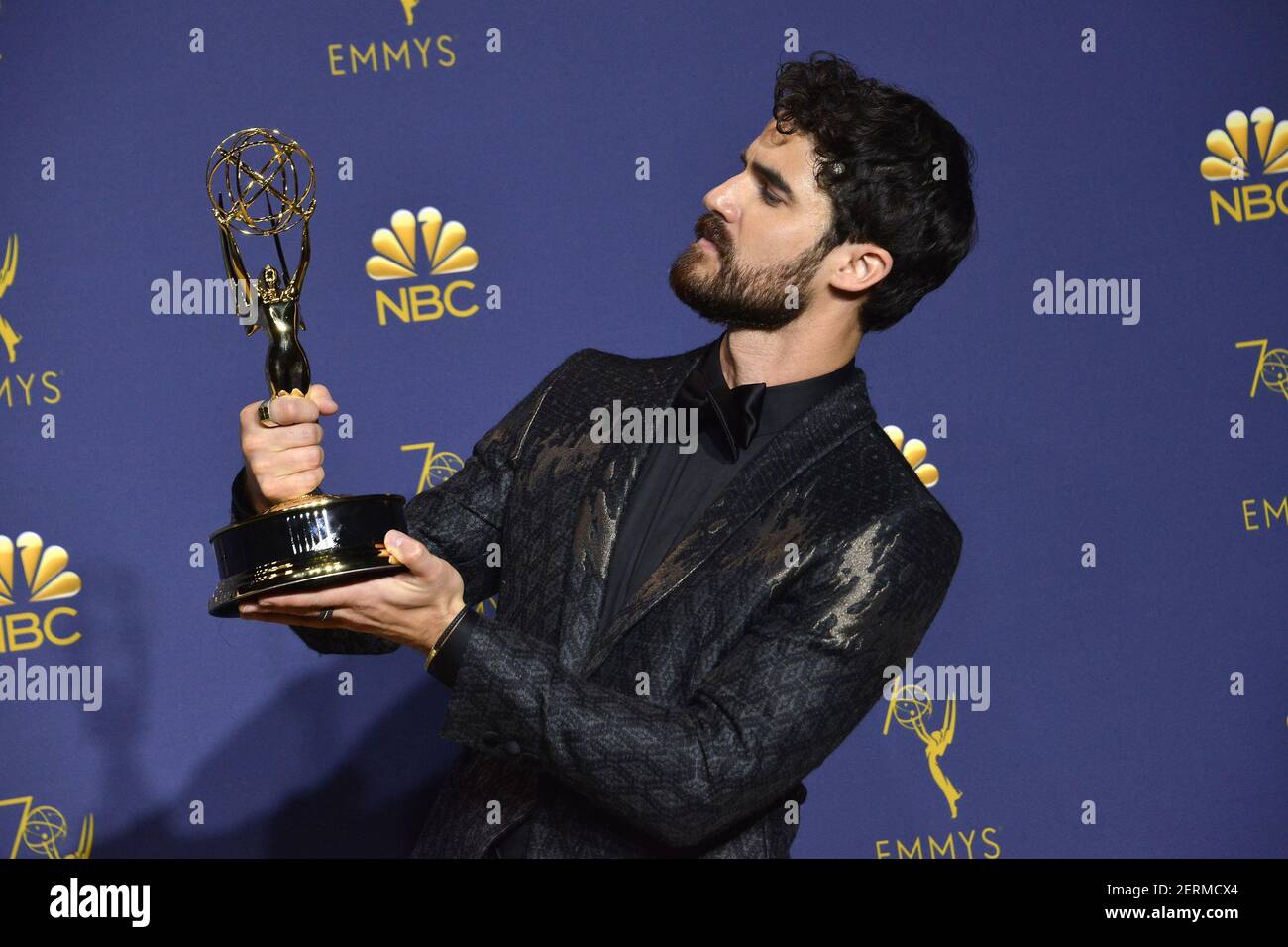 Darren Criss, winner of the award for outstanding lead actor in a limited  series, movie or dramatic special for 'The Assassination of Gianni Versace:  American Crime Story' poses in the press room