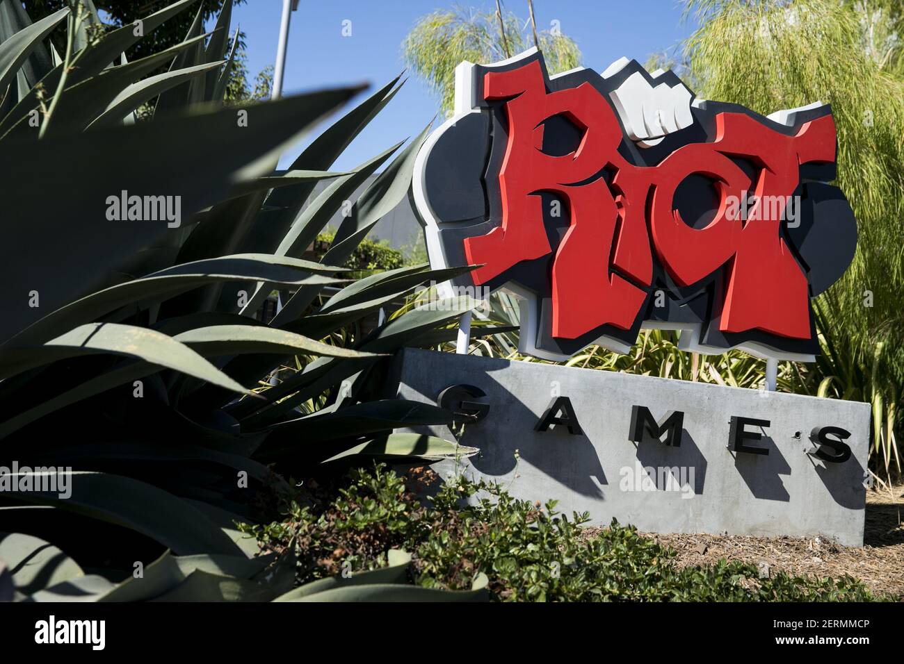 A logo sign outside of the headquarters of Riot Games, Inc., in Los ...