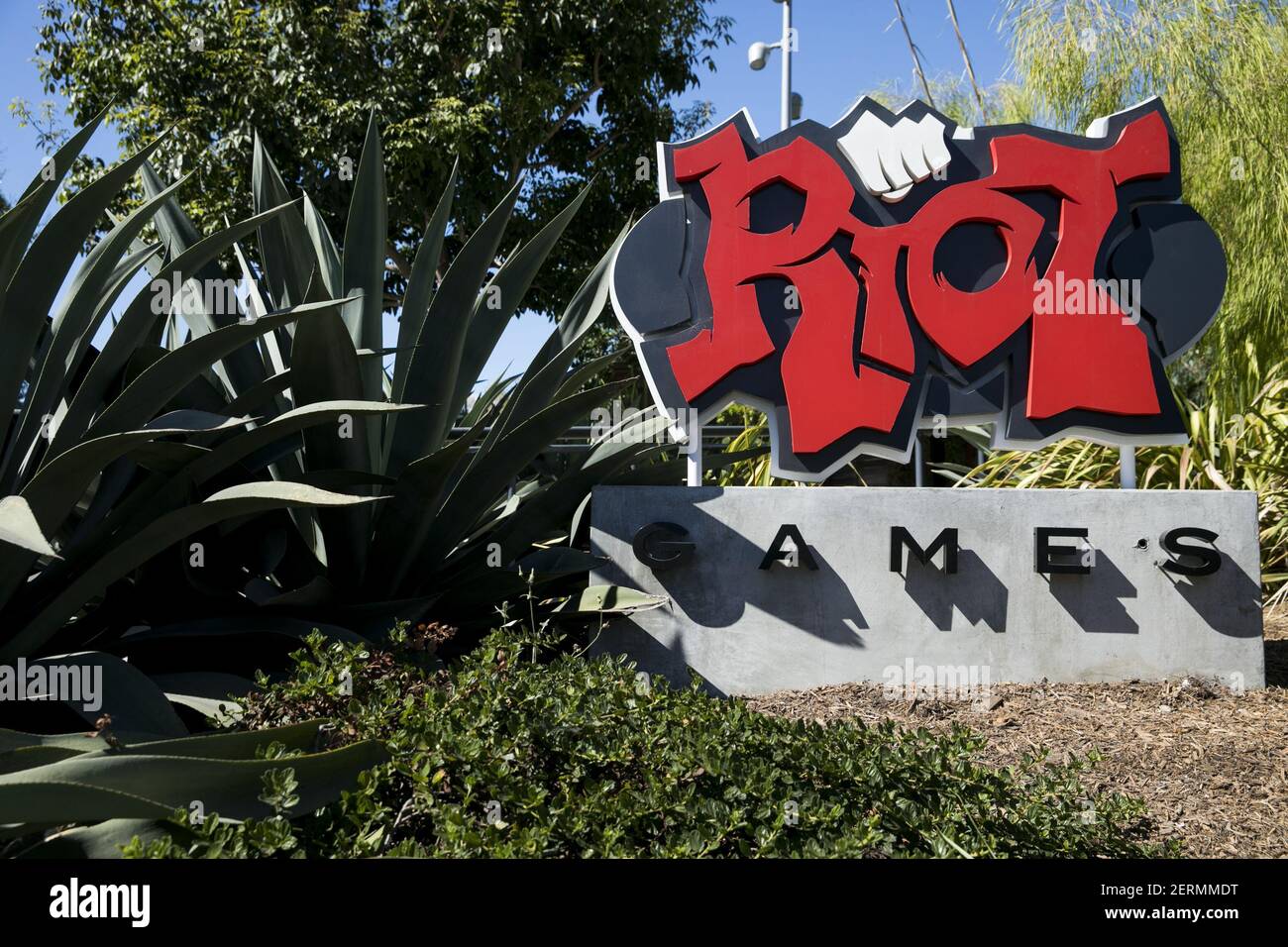 A logo sign outside of the headquarters of Riot Games, Inc., in Los ...