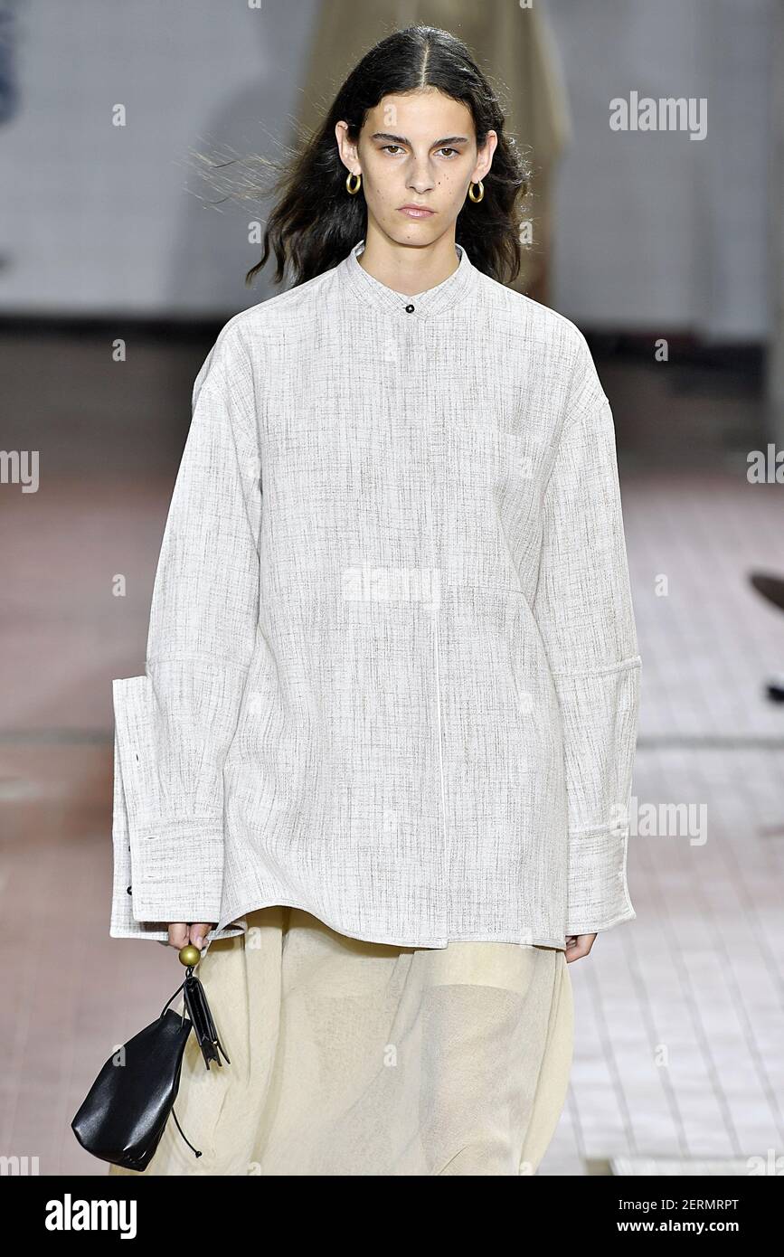 Model Cyrielle Lalande walks on the runway during the Jil Sander Fashion  Show during Milan Fashion