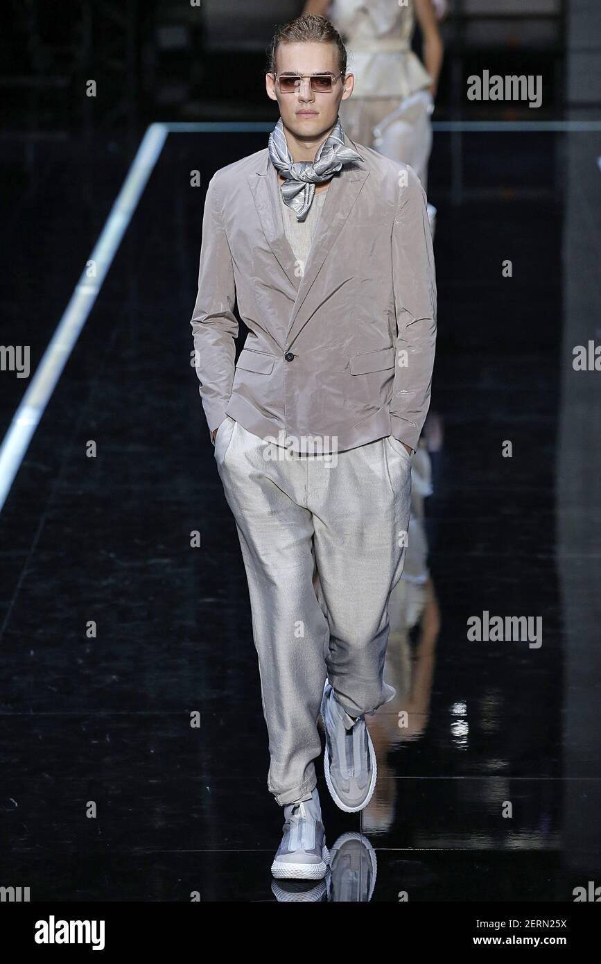 Joseph Sayers walks on the runway during the Emporio Armani Fashion ...