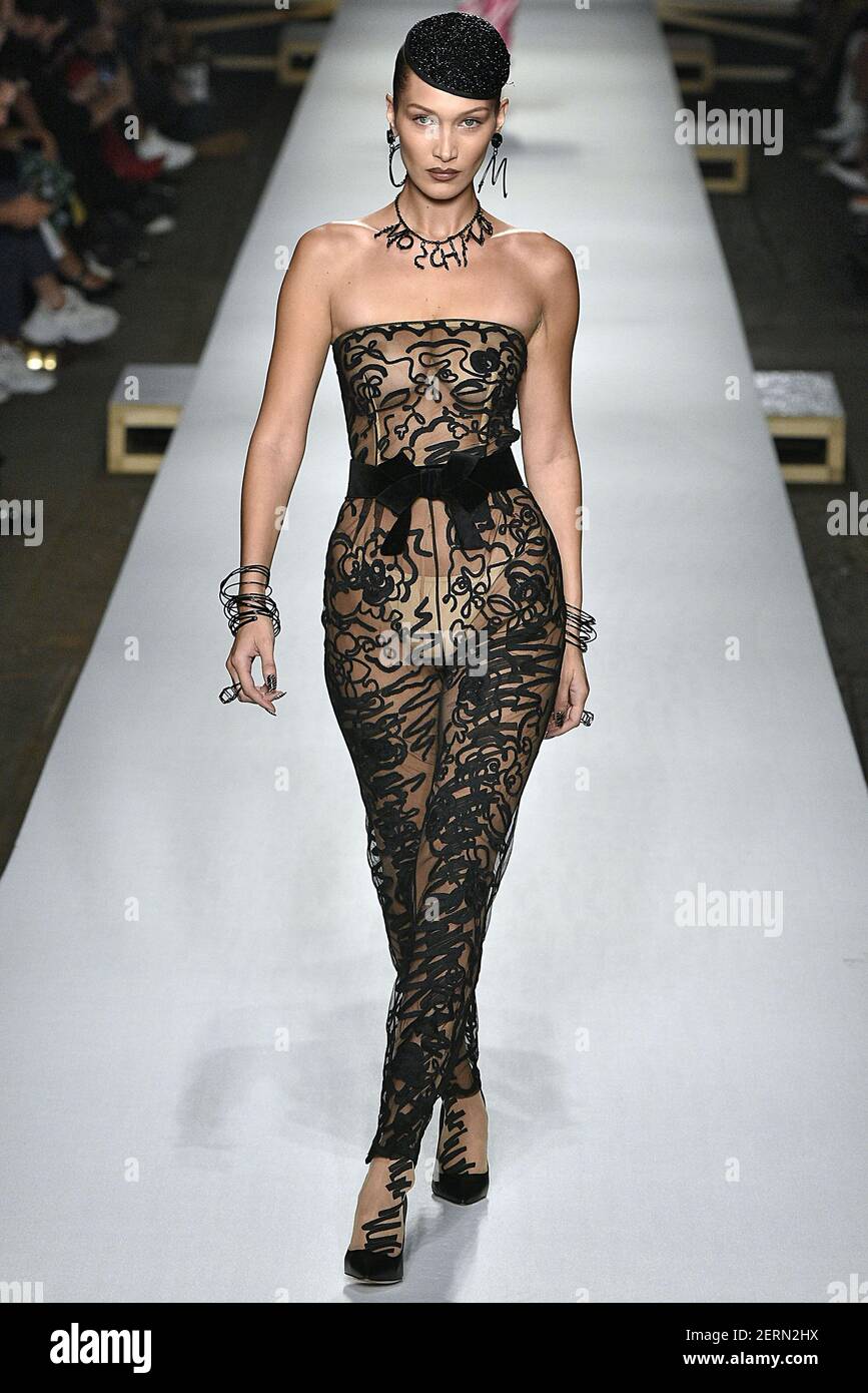 Bella Hadid Arrives For Milan Fashion Week in Boho Chic Style – Footwear  News