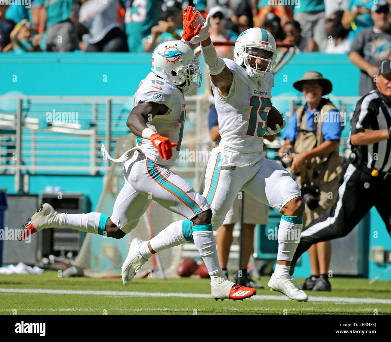 Miami Dolphins' Jakeem Grant (19) high-fives with Albert Wilson 