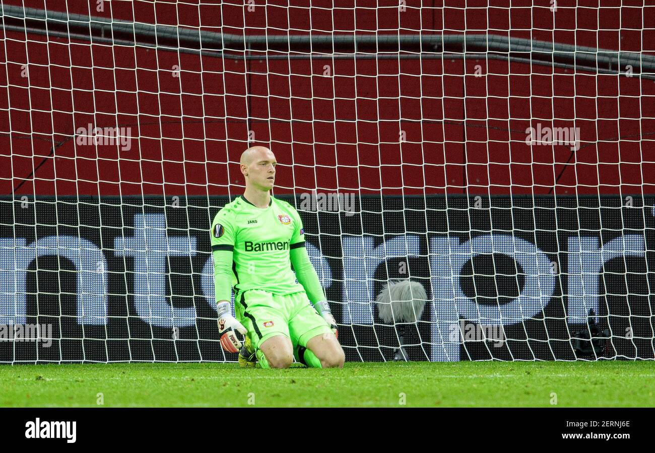 goalwart Niklas LOMB (LEV) on the ground after the goal to 0: 1 and his goalwart error, blunder, error, faux pas. Soccer Europa League, sixteenth-final match, Bayer 04 Leverkusen (LEV) - Young Boys Bern 0: 2, on February 25th, 2021 in Leverkusen/Germany. Â | usage worldwide Stock Photo