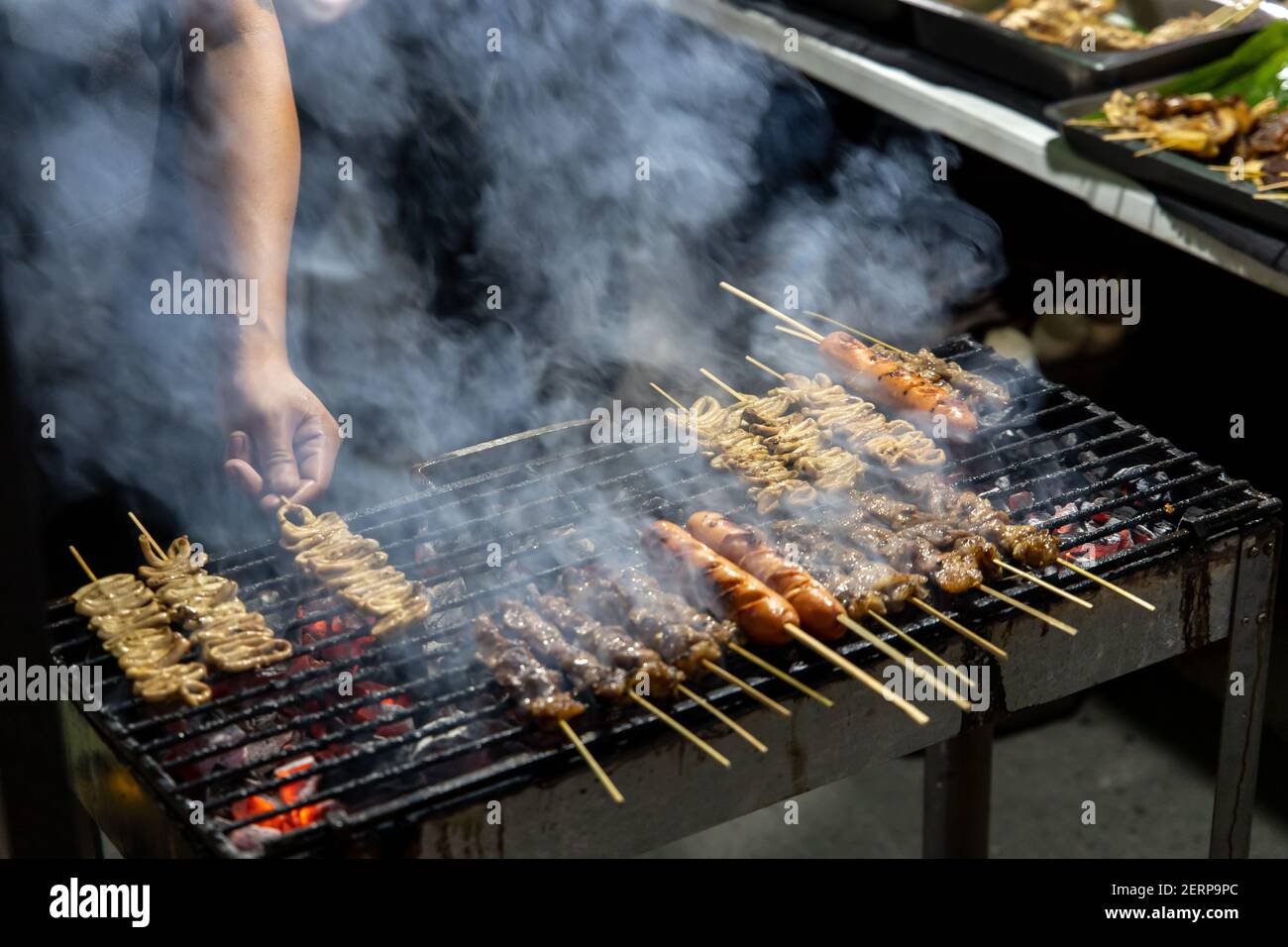 Philippines traditional barbecue stick on the grill at restaurant Stock