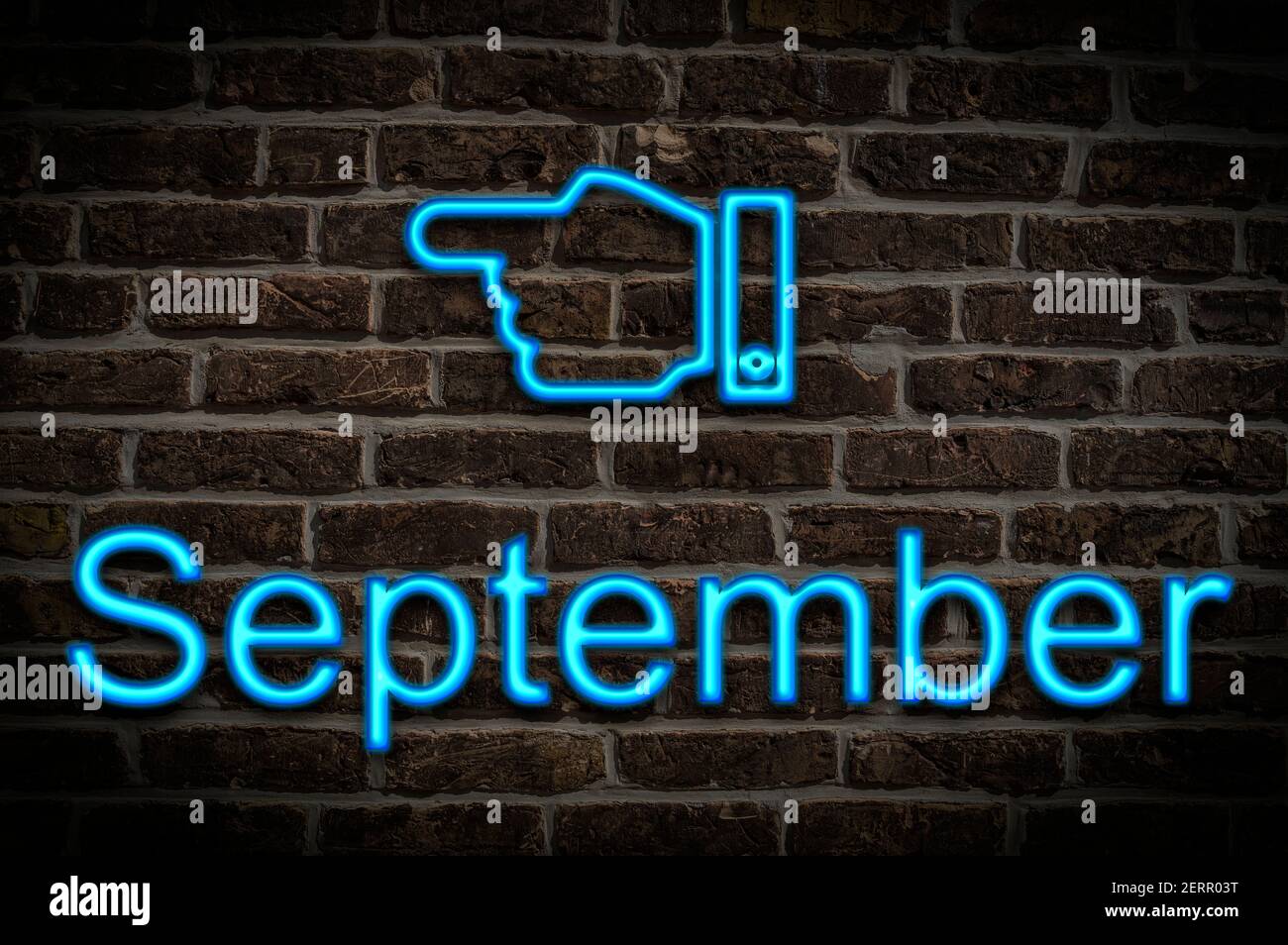 Detail photo of a neon sign on a wall with the inscription September ...