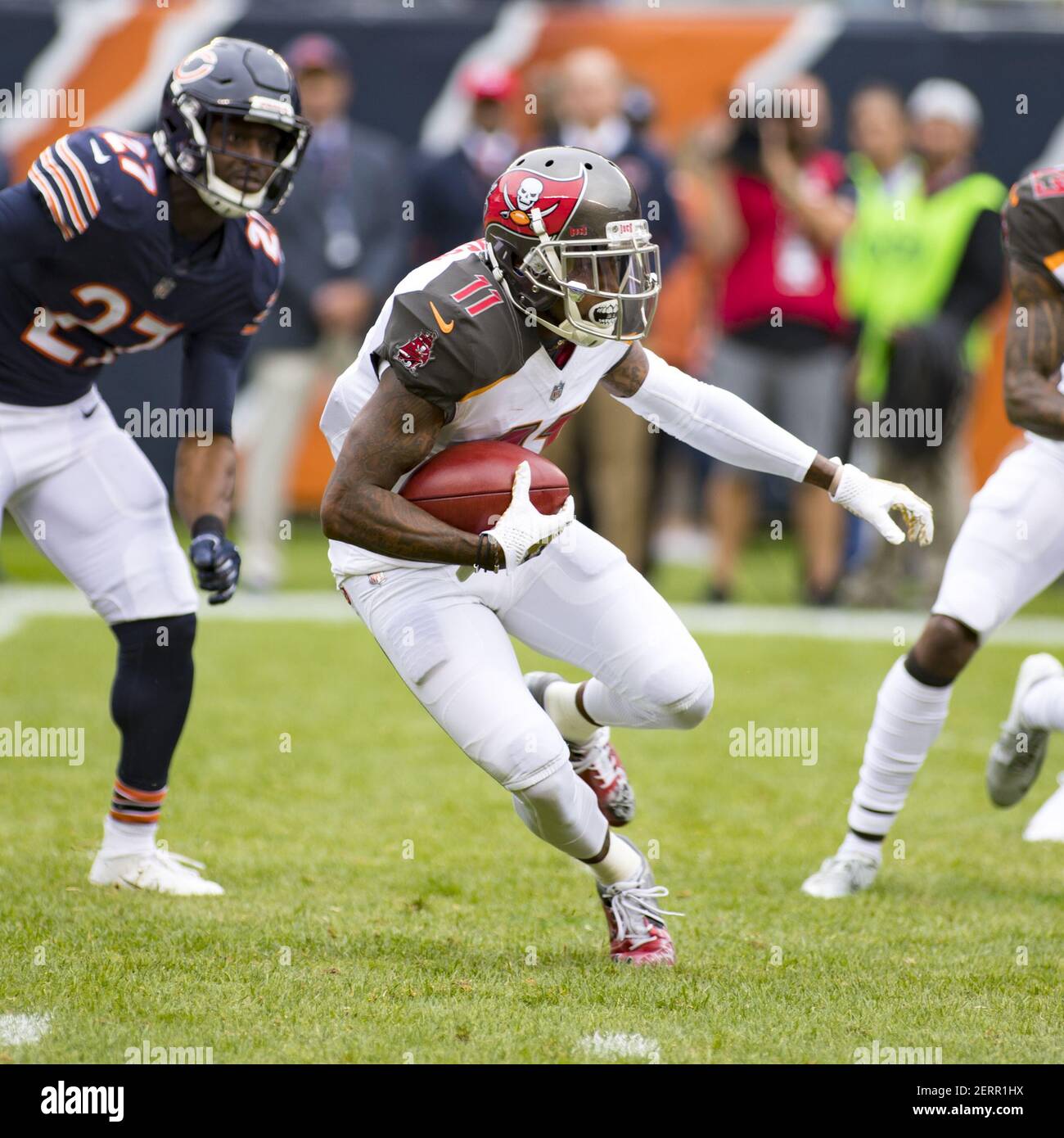 September 30, 2018: Chicago, Illinois, U.S. - Bears #39 Eddie Jackson  tackles Buccaneers #25 Peyton Barber during the NFL Game between the Tampa  Bay Buccaneers and Chicago Bears at Soldier Field in