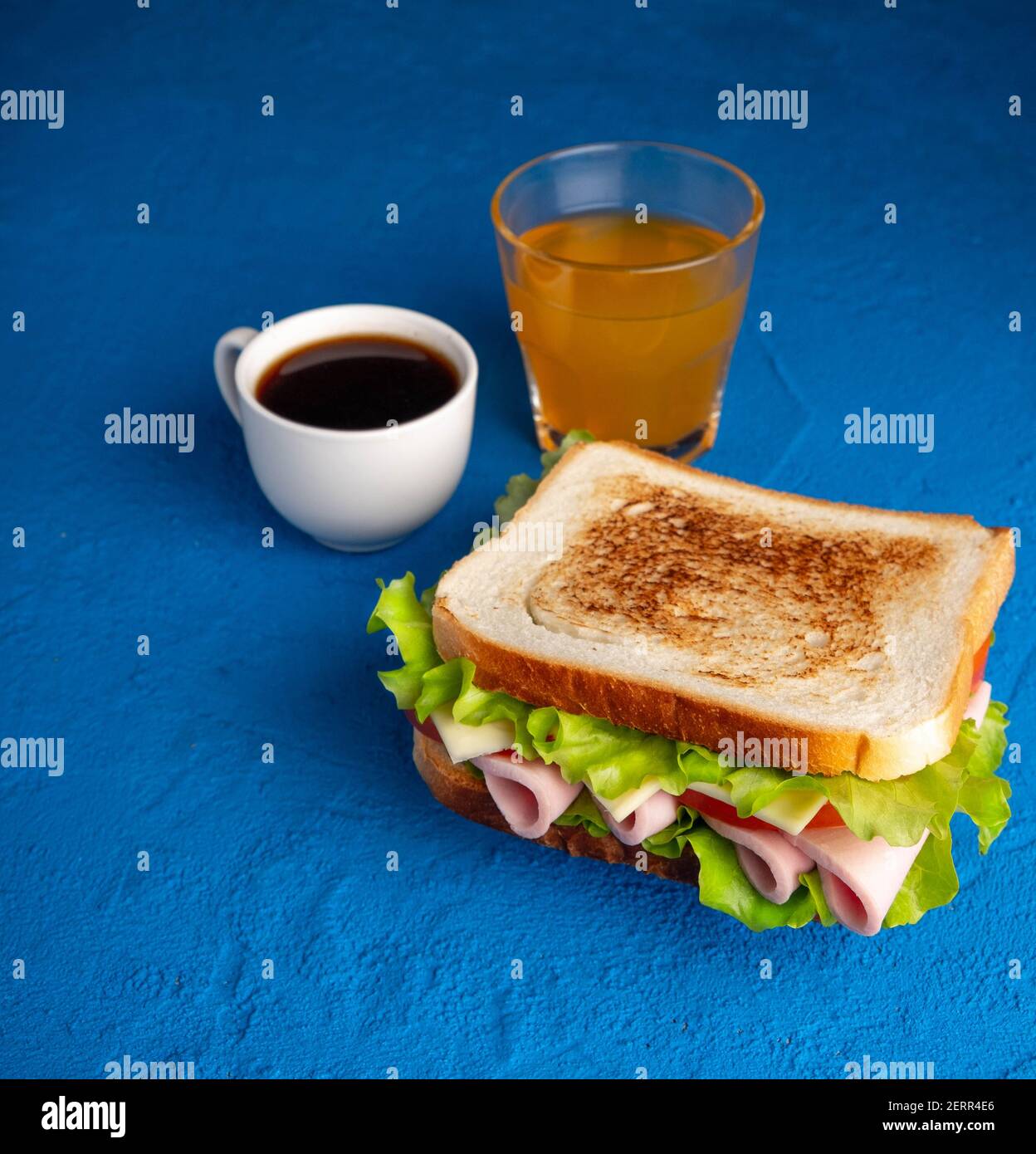 Sandwich, coffee and juice. Breakfast. Stock Photo