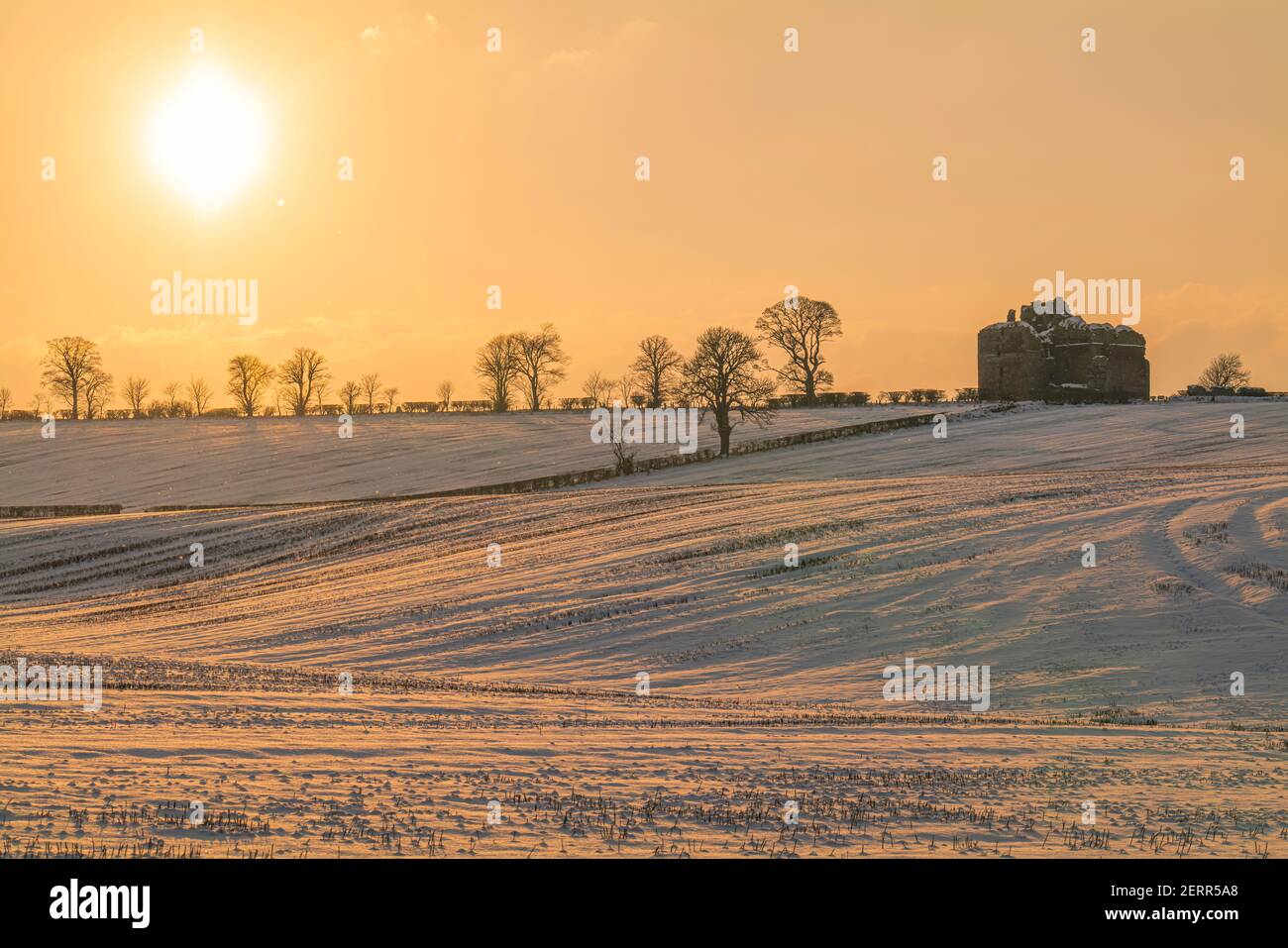 Morebattle, Kelso, Scottish Borders, Scotland, UK. 12th February 2021. Cessford Castle at sunset, once the stronghold of the Border Reivers of the Mid Stock Photo