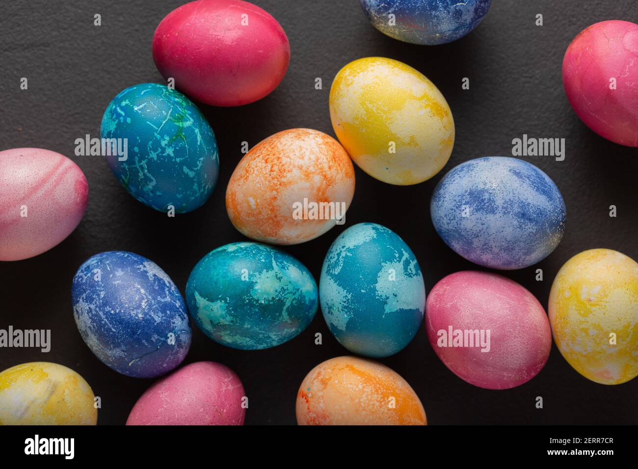 Easter eggs against dark background with copy space Stock Photo