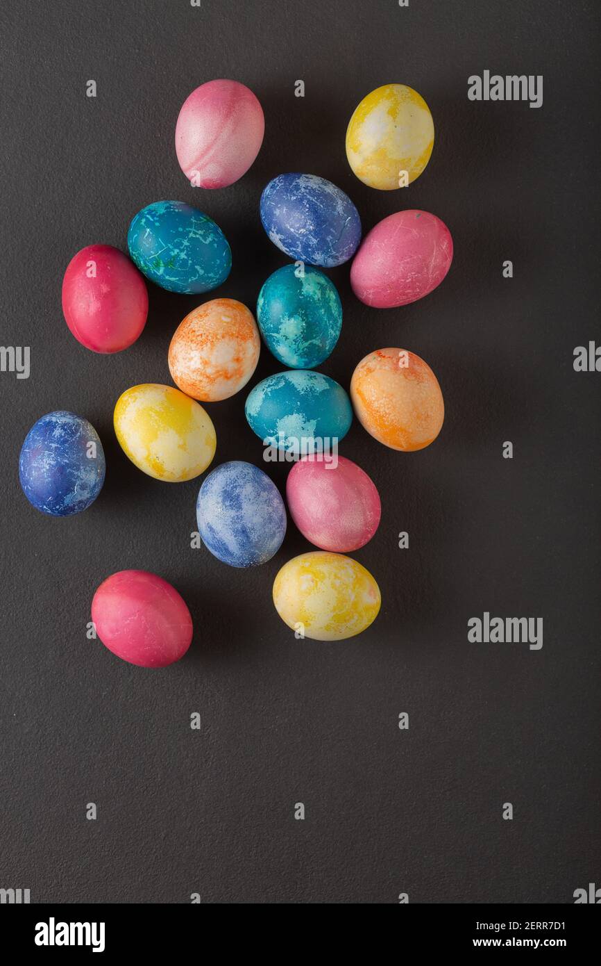 Easter eggs against dark background with copy space Stock Photo