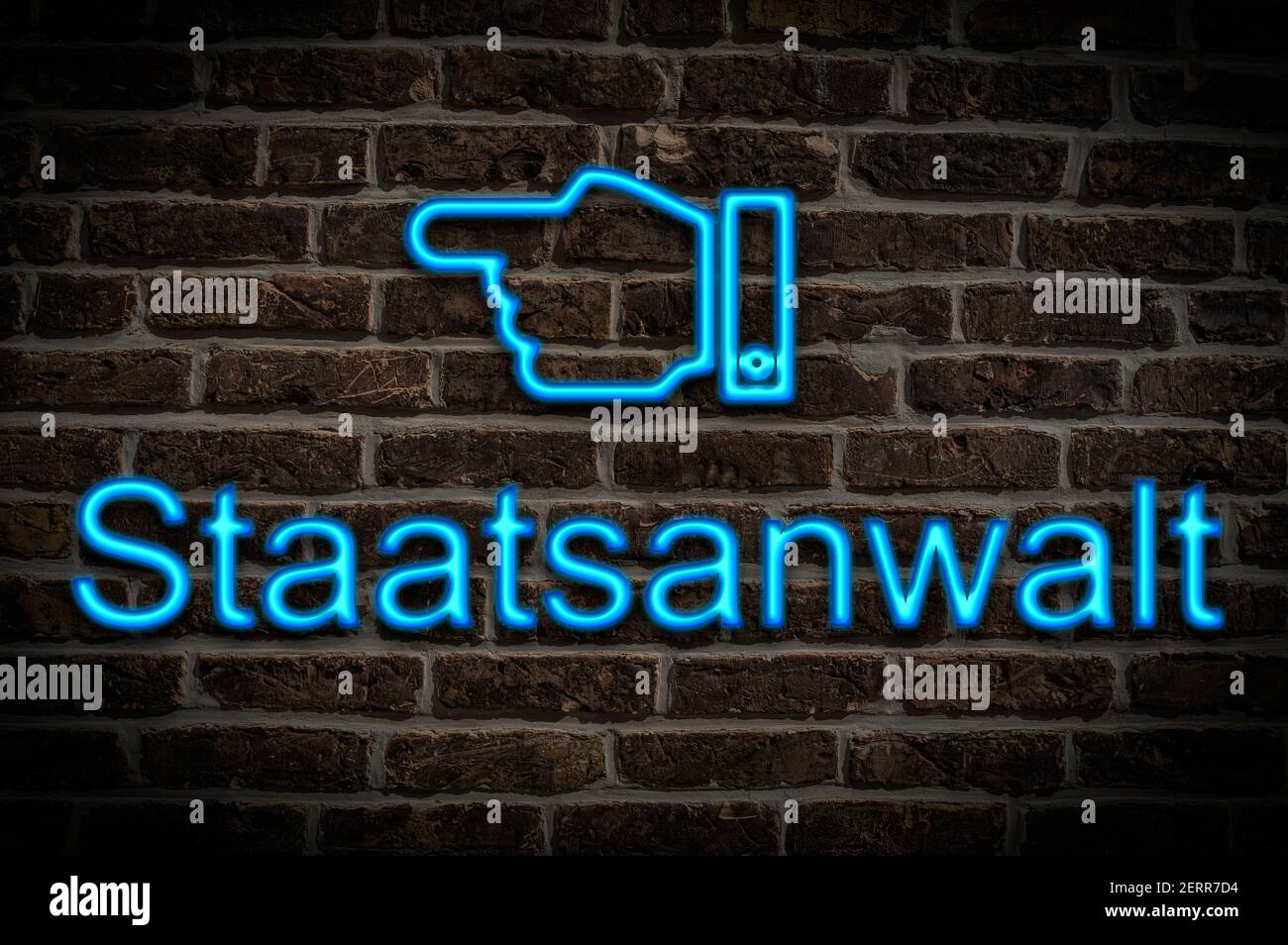 Detail photo of a neon sign on a wall with the inscription Staatsanwalt (Prosecutor) Stock Photo