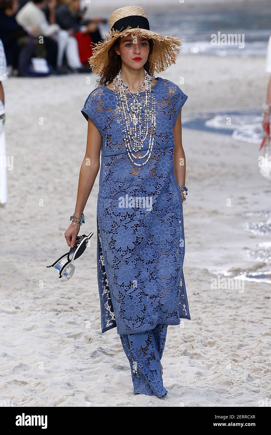 Model Emm Arruda walks on the runway during the Chanel Fashion