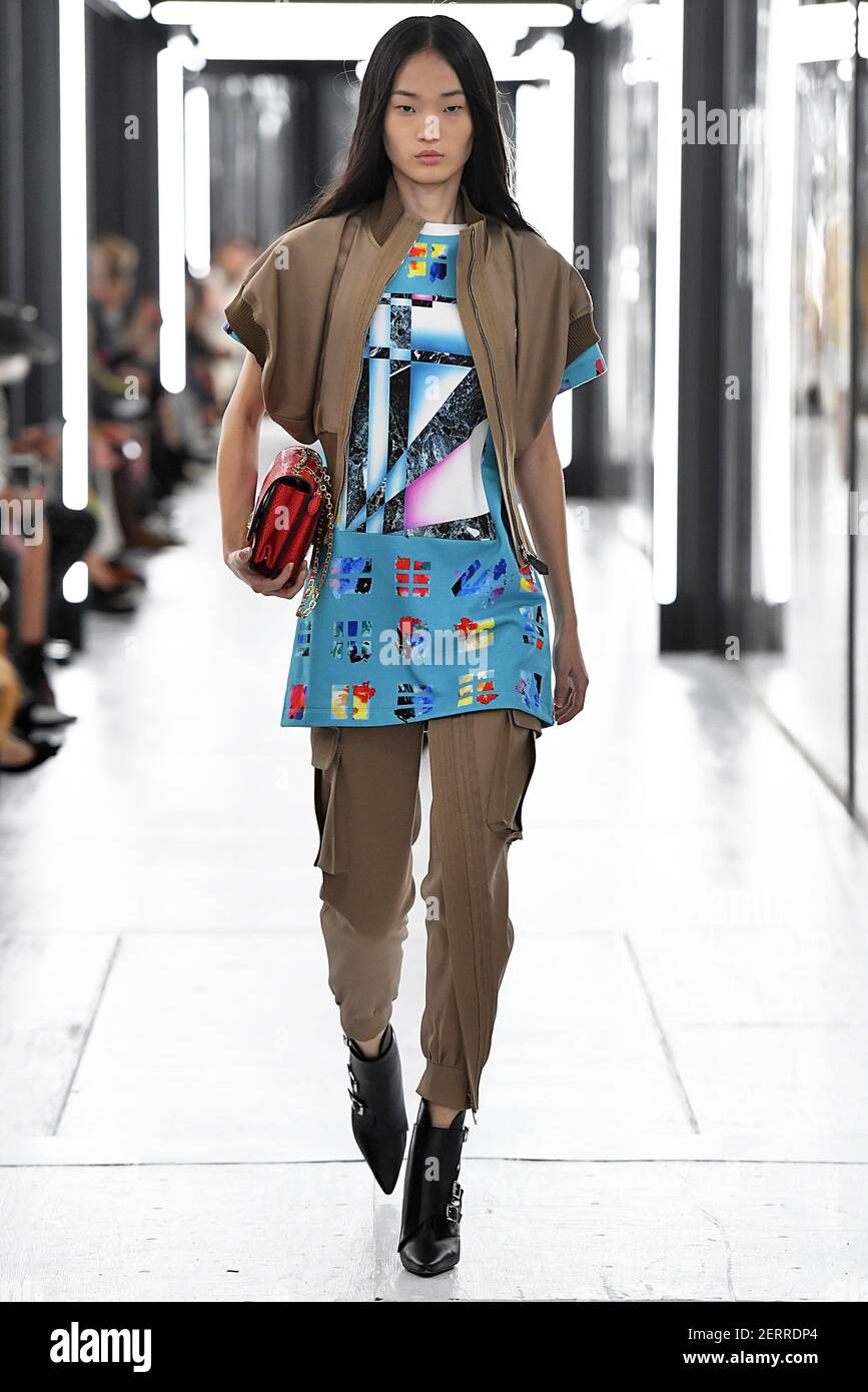 Hyun Ji Shin walks on the runway during the Louis Vuitton Fashion Show ...