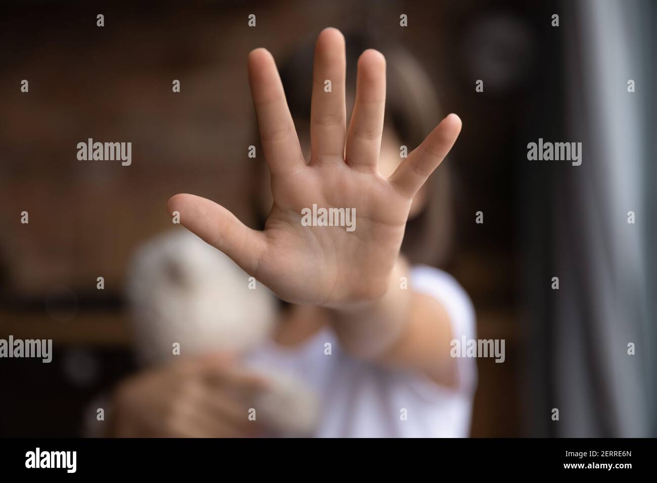 Close up of small girl show ho hand gesture Stock Photo