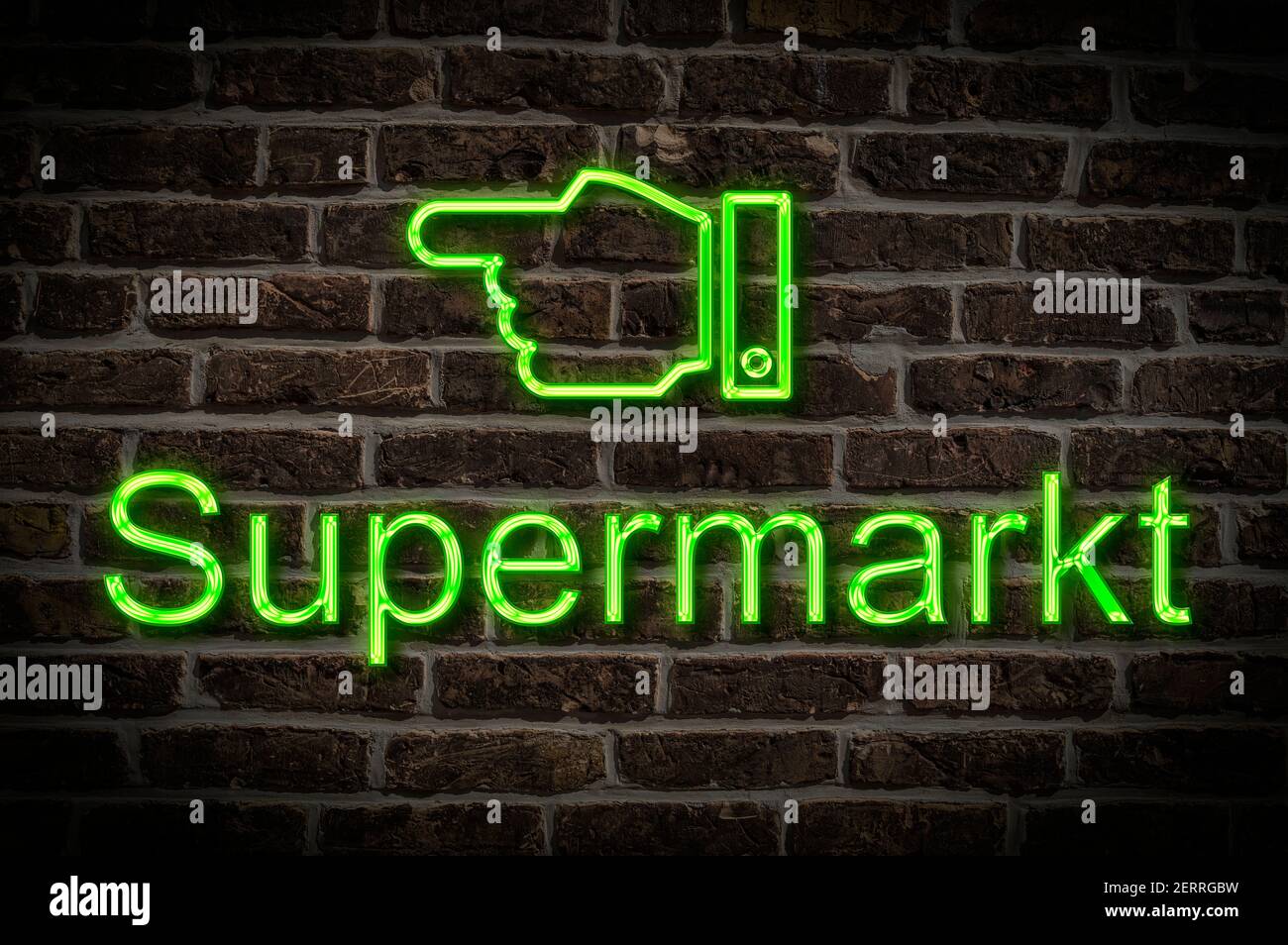 Detail photo of a neon sign on a wall with the inscription Supermarkt (Supermarket) Stock Photo