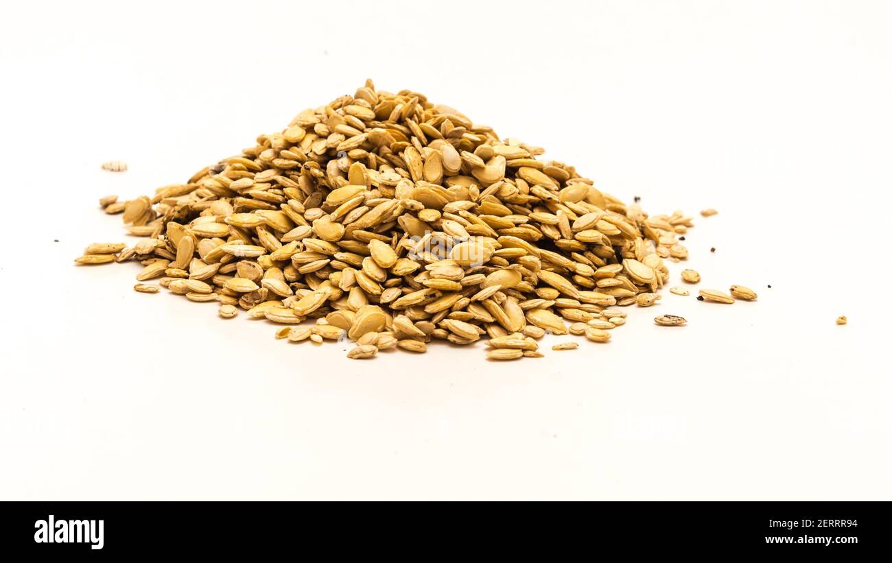A mound of winter melon wax gourd seeds isolated on white background Stock Photo