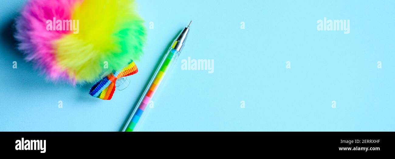 Colorful stationery. multicolored pen on blue background. banner Stock Photo