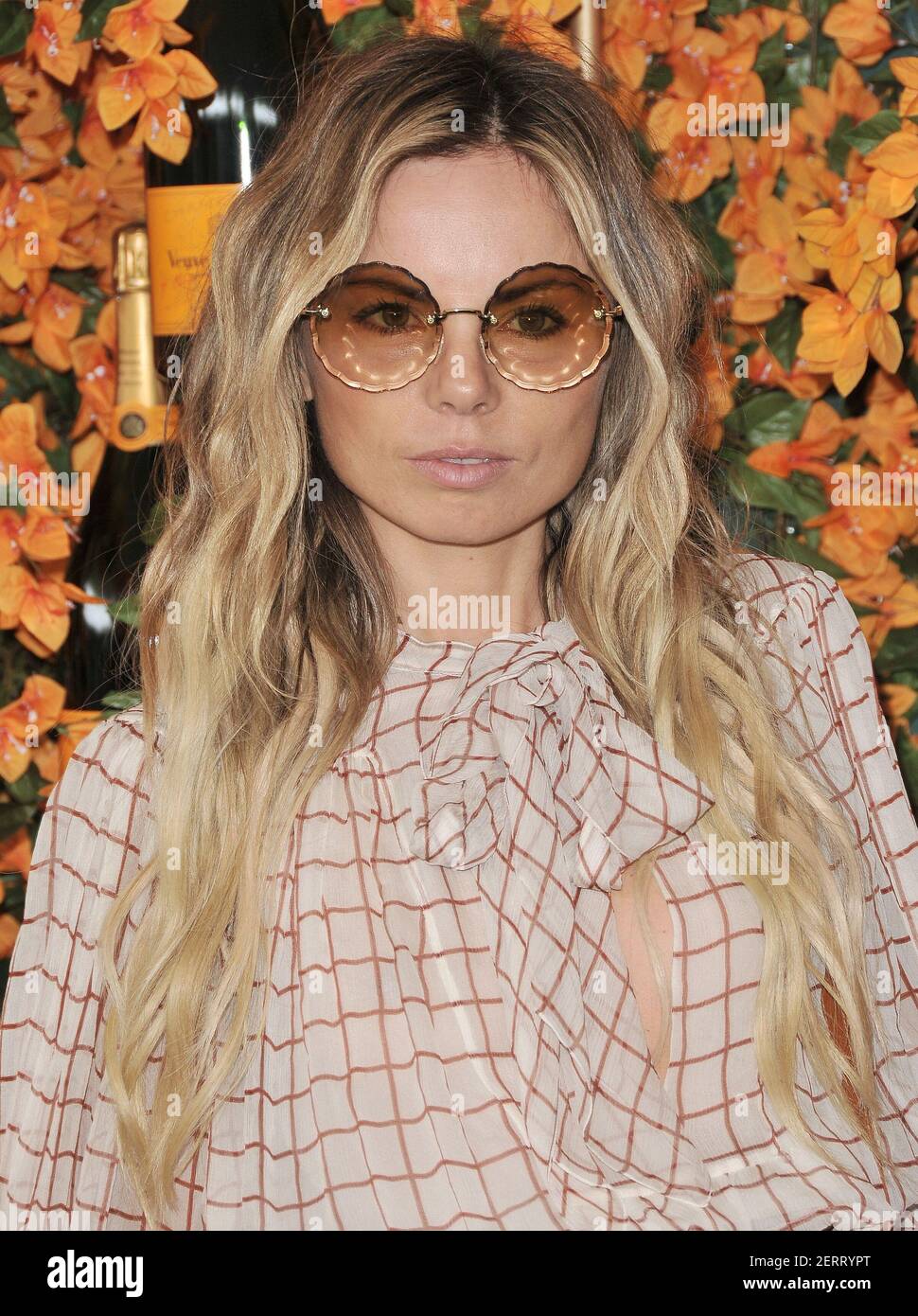 Erica Pelosini arrives at the 9th Annual Veuve Clicquot Polo Classic