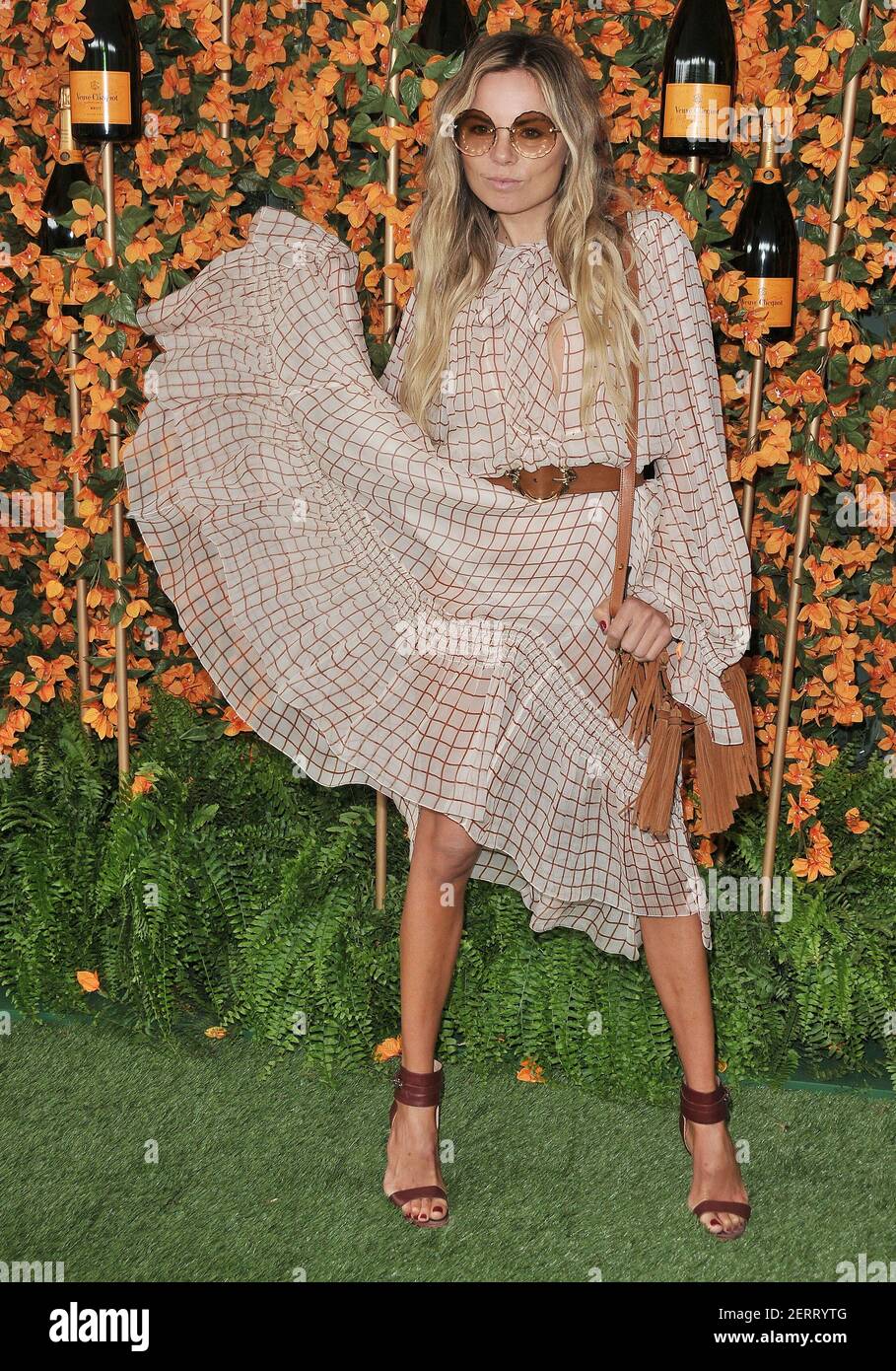 Erica Pelosini arrives at the 9th Annual Veuve Clicquot Polo Classic