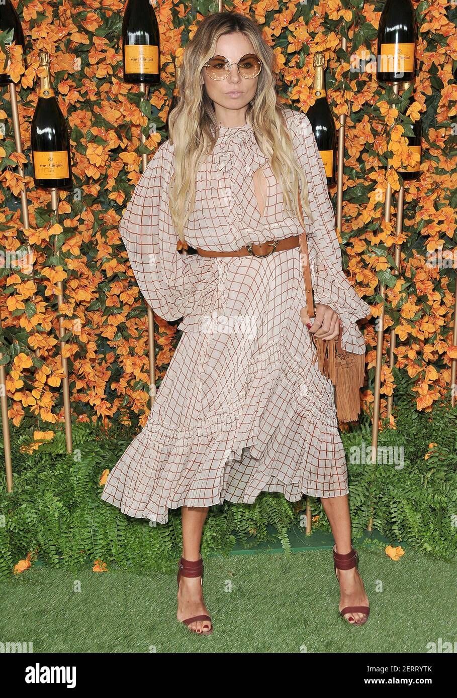 Erica Pelosini arrives at the 9th Annual Veuve Clicquot Polo Classic