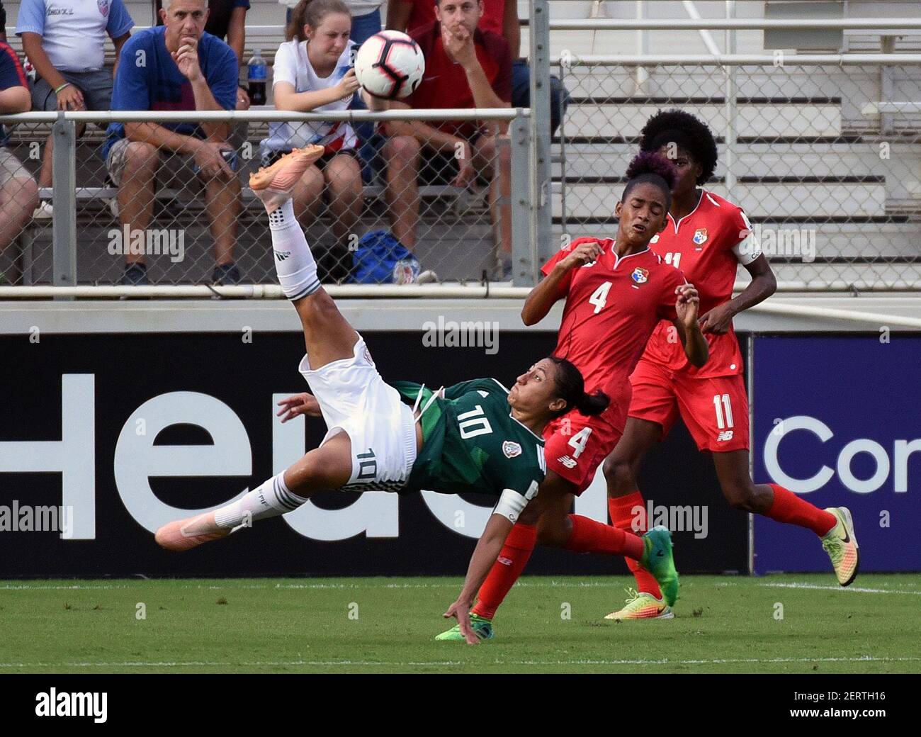 Oct 10, 2018; Cary, NC, USA; Mexico midfielder Stephany Mayor (10) volleys the ball in front of Panama midfielder Katherine Castillo (4) during the first half of a 2018 CONCACAF Women's Championship soccer match at Sahlen's Stadium. Mandatory Credit: Rob Kinnan-USA TODAY Sports/Sipa USA Stock Photo