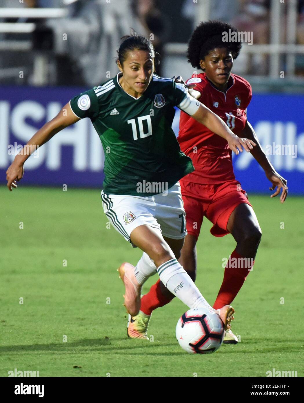 Oct 10, 2018; Cary, NC, USA; Mexico midfielder Stephany Mayor (10) dribbles toward goal as Panama forward Natalia Mills (11) defends during the second half of a 2018 CONCACAF Women's Championship soccer match at Sahlen's Stadium. Mandatory Credit: Rob Kinnan-USA TODAY Sports/Sipa USA Stock Photo