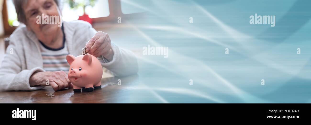 Elderly woman putting a coin in a piggy bank; panoramic banner Stock ...