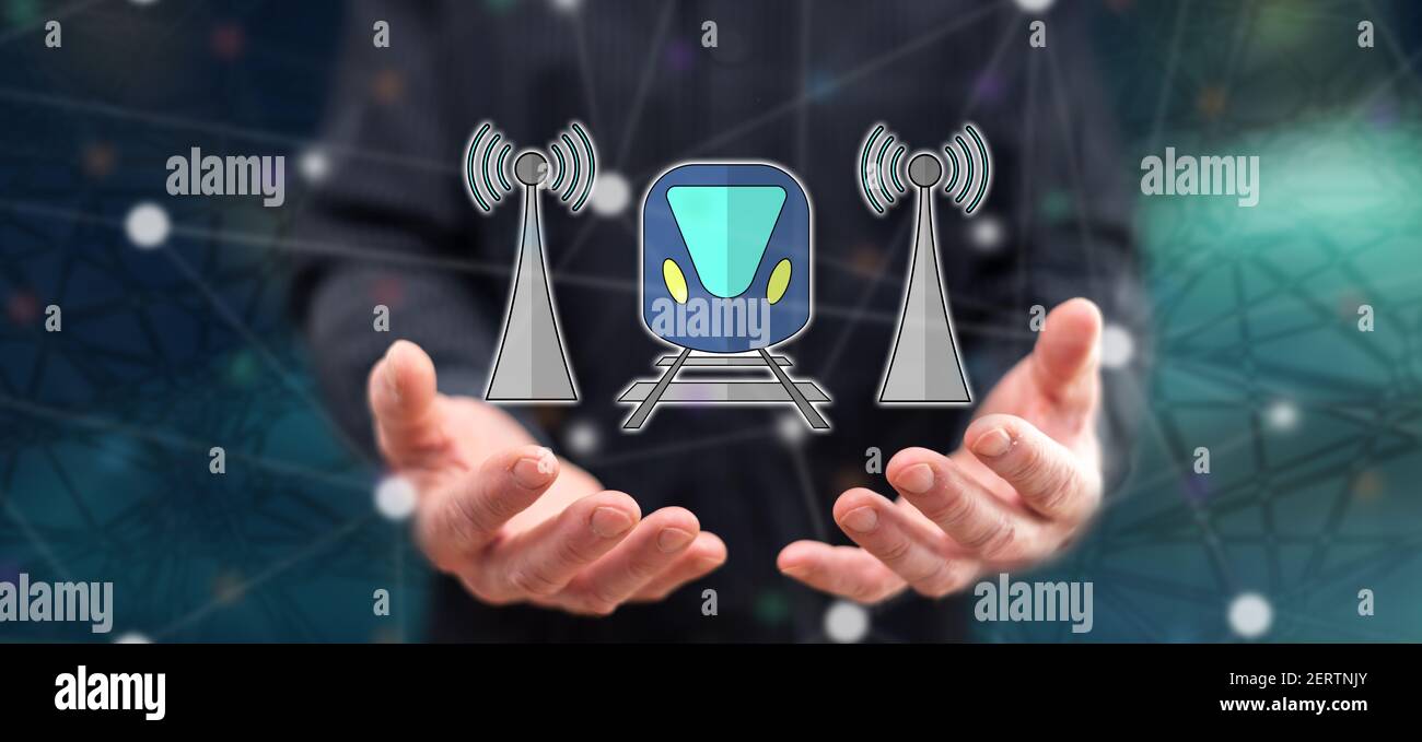 Smart train concept above the hands of a man in background Stock Photo ...