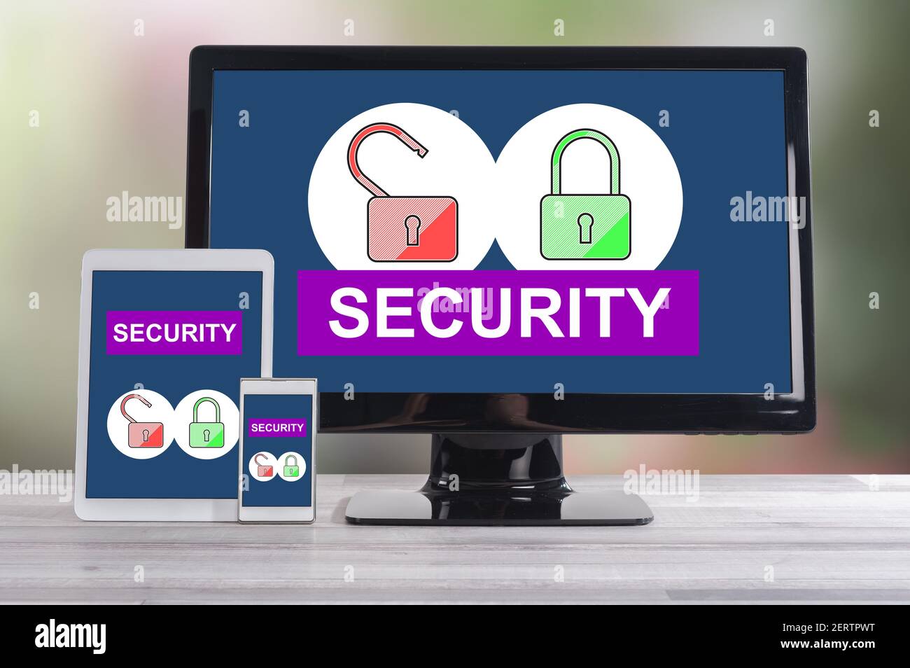 Security concept shown on different information technology devices Stock Photo