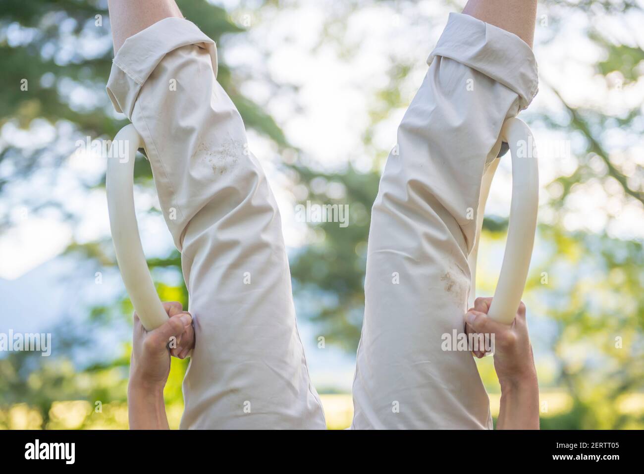 Women hanging upside down hi-res stock photography and images - Alamy
