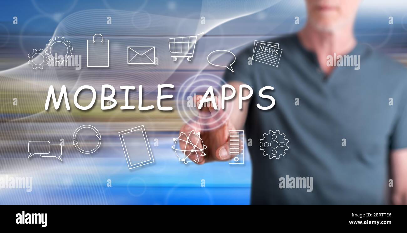 Man touching a mobile apps concept on a touch screen with his finger ...