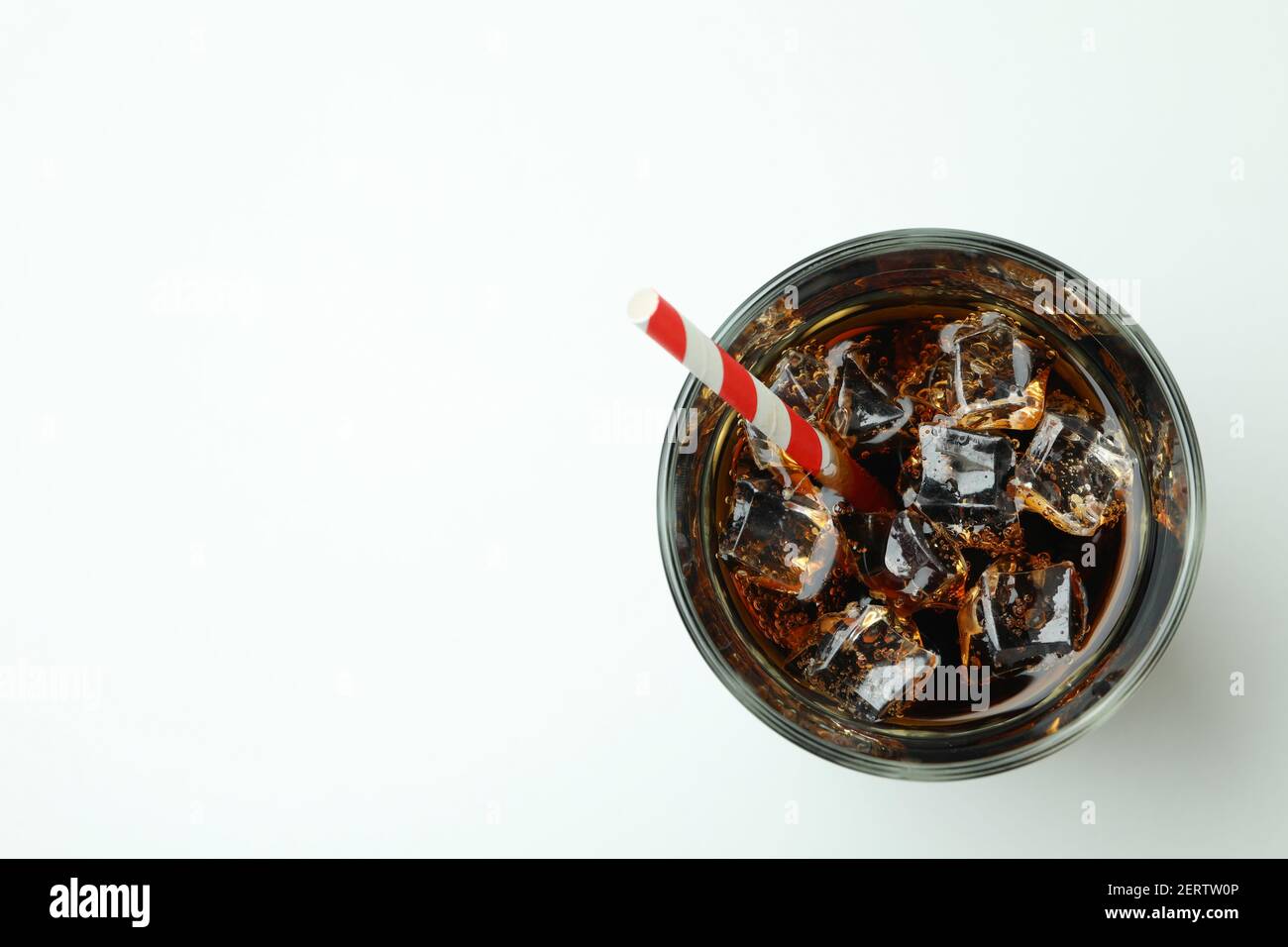 Glass of cola with ice cubes and straw on white background Stock Photo ...