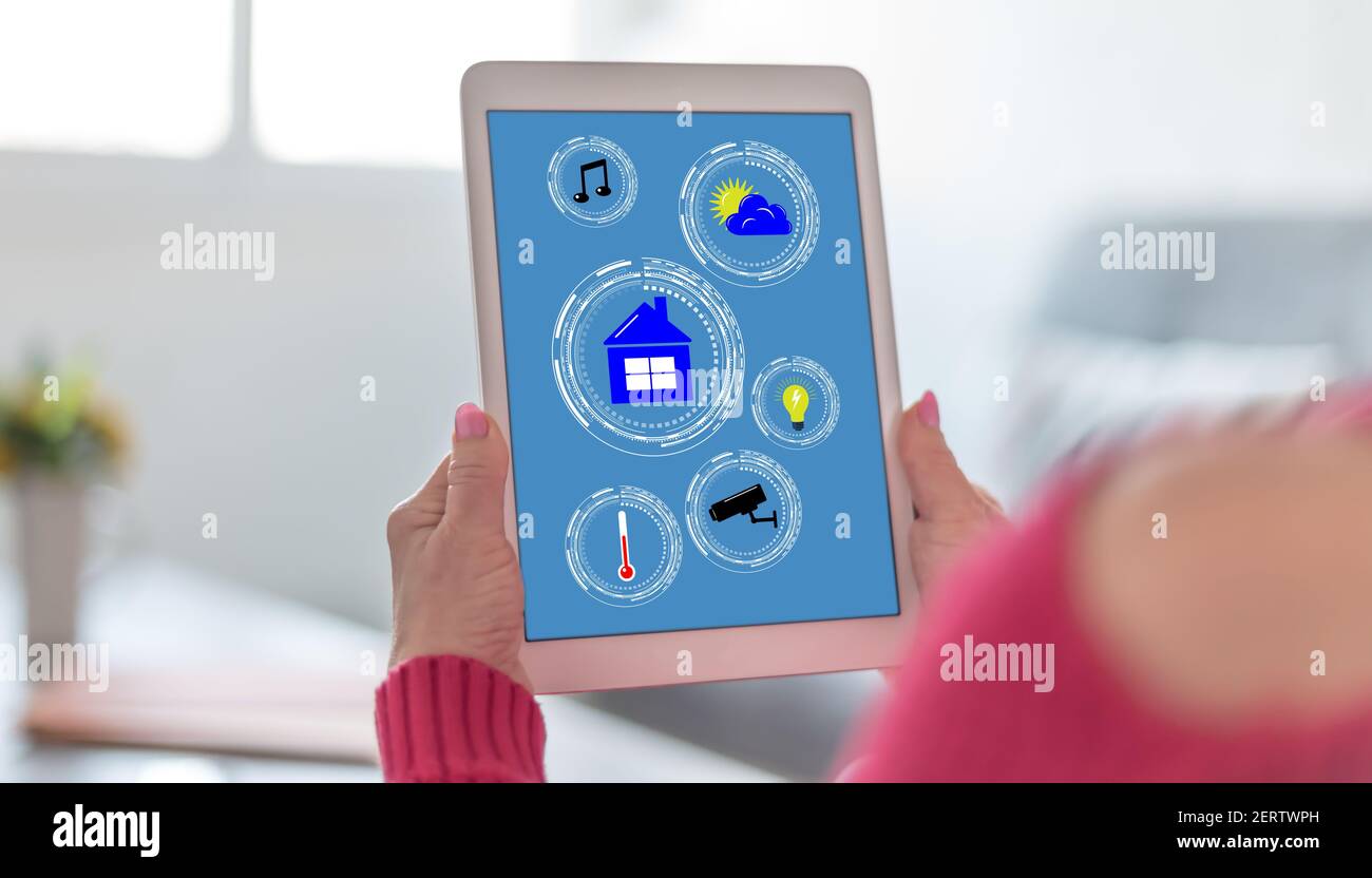 Tablet screen displaying a smart home automation concept Stock Photo ...