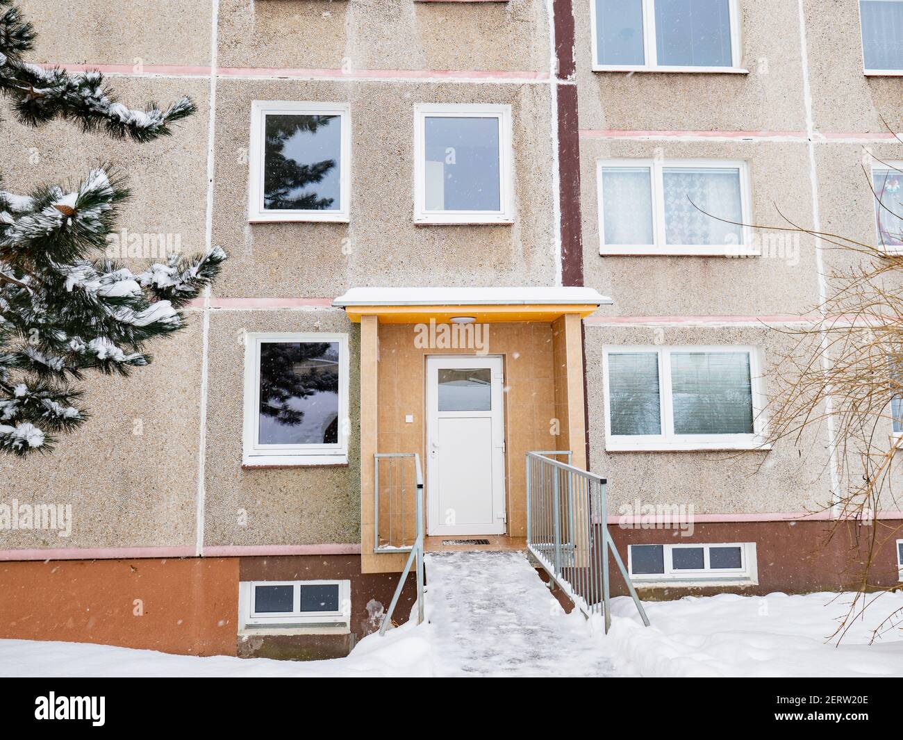 Modern apartment building with colorful facades on the outskirts of  winter city. Residential Complex Stock Photo