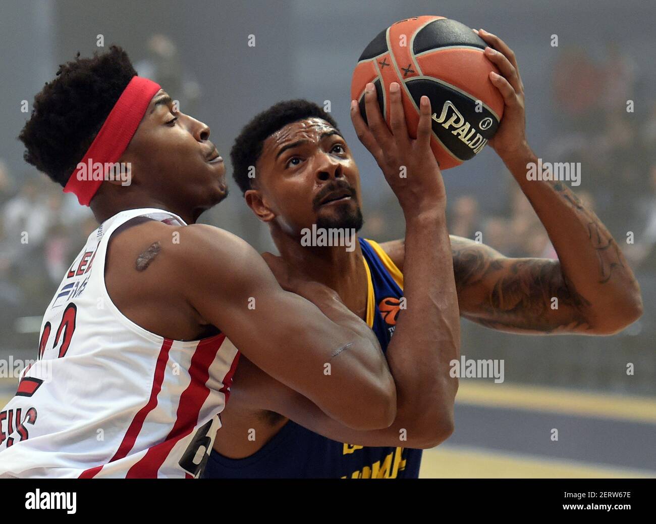 Euroleague Basketball. The match between Khimki (Russia, Khimki) and  Olympiakos (Greece, Piraeus) was held in the sports complex Arena-Mytischi.  Charles Jenkins of Khimki (right) and Zack Ledey of Olympiacos (left)  during the