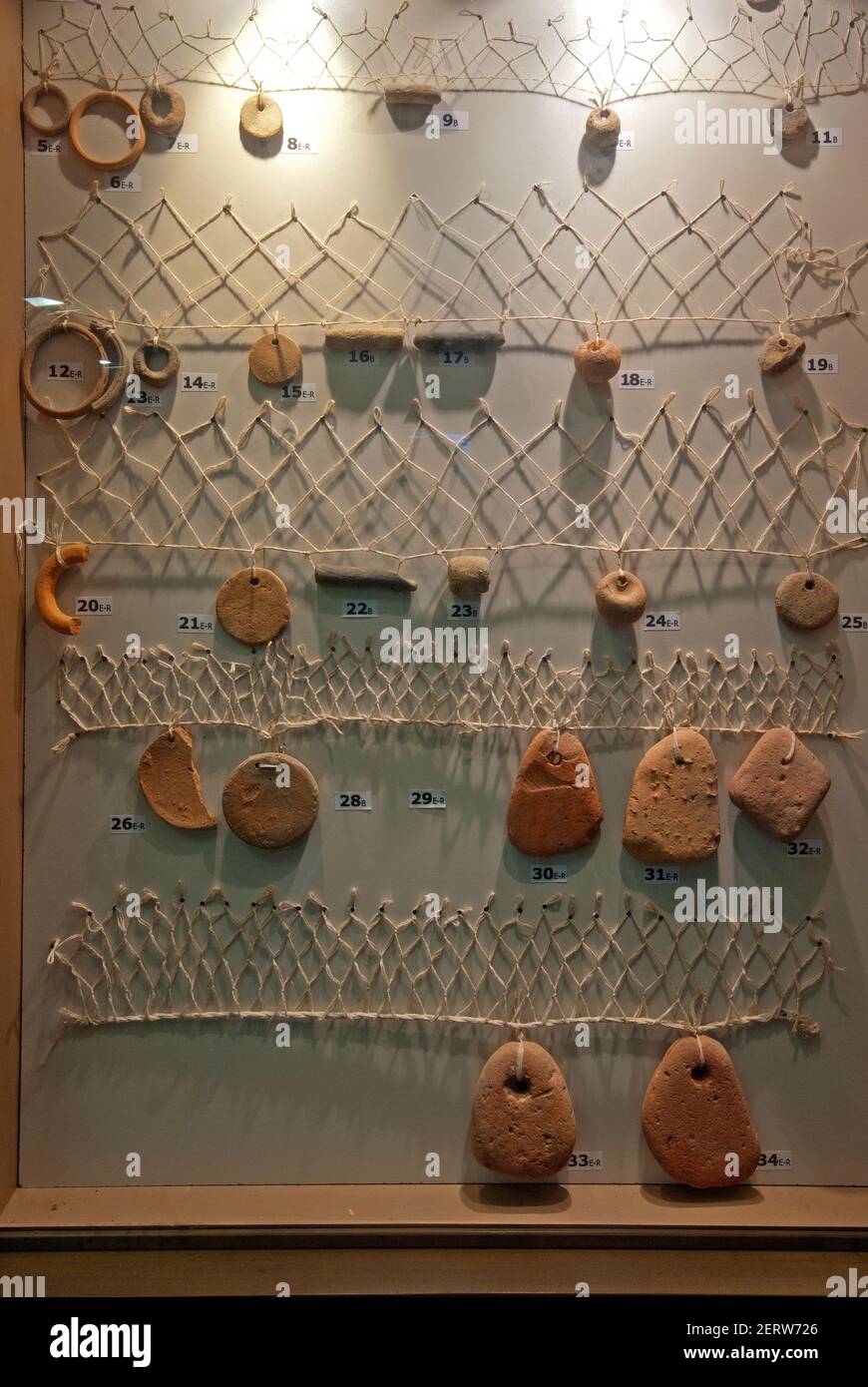 Stone weights for fishing nets hi-res stock photography and images - Alamy