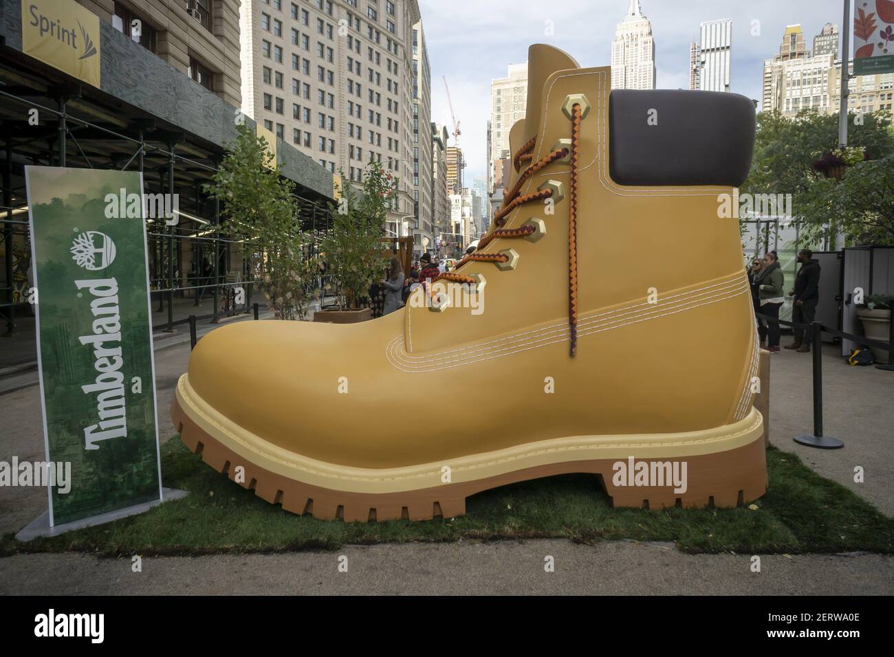 A giant Timberland boot attracts visitors to Flatiron Plaza in New York on Tuesday, October 16, 2018 where they can pot a free succulent a branding event for VF Corp.'s Timberland